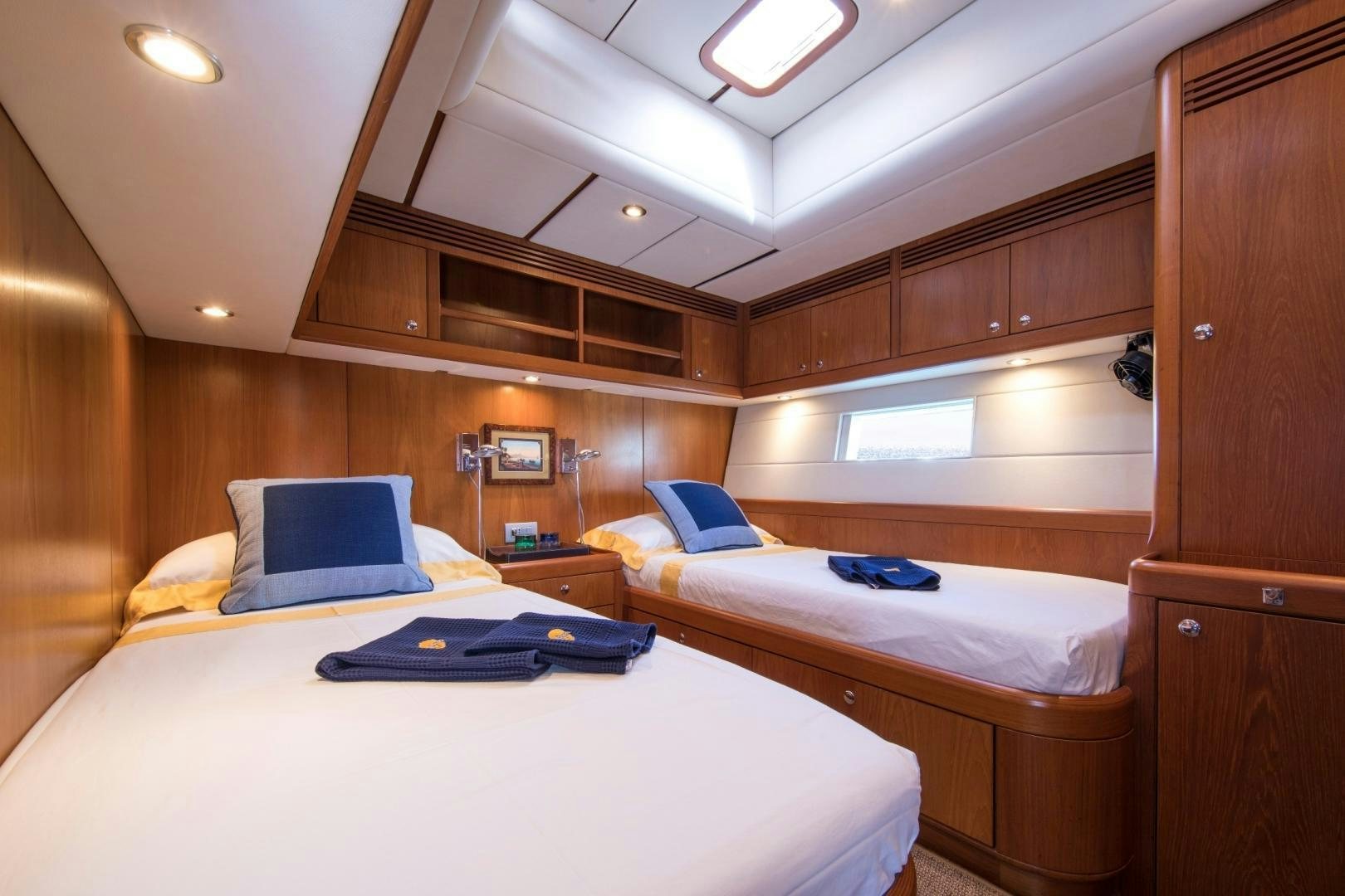 a room with two beds aboard MEDUSA Yacht for Sale