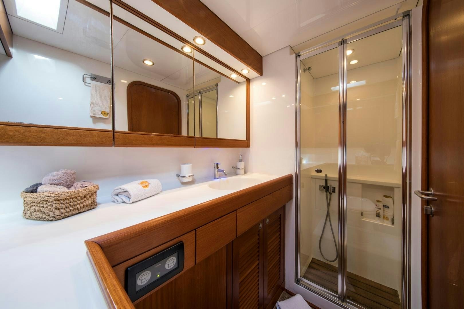 a bathroom with a large mirror aboard MEDUSA Yacht for Sale