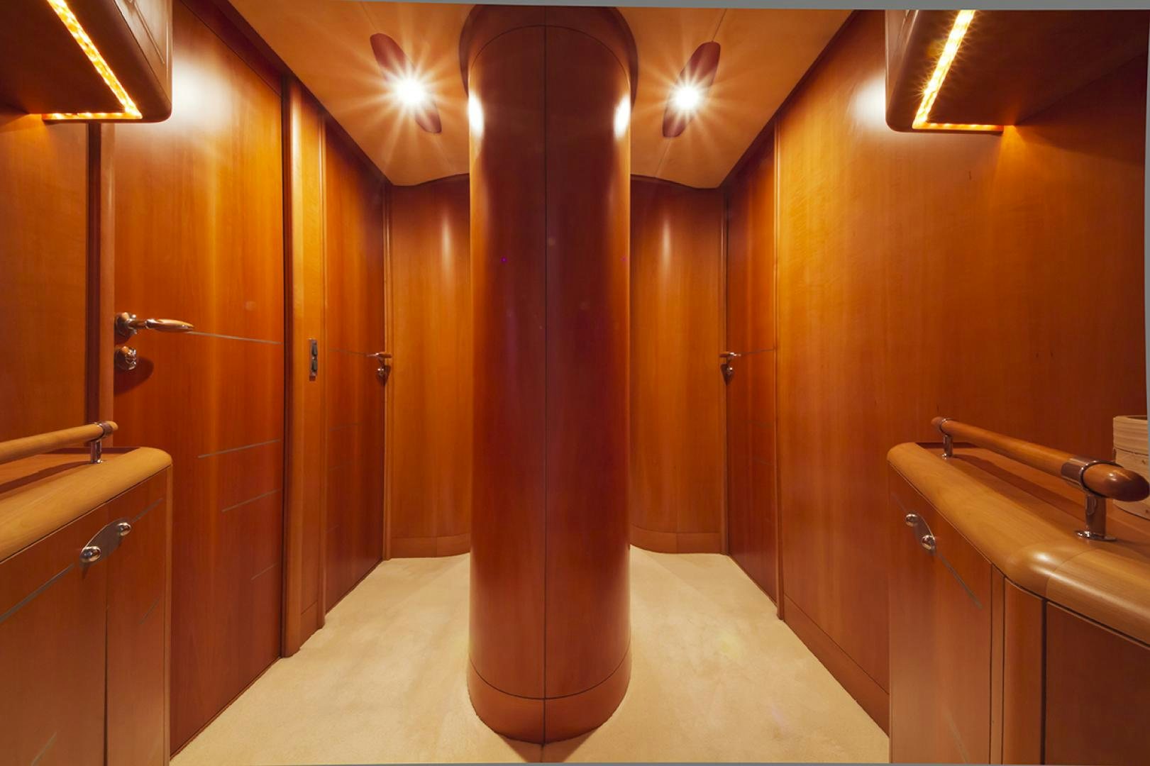 a large bathroom with a tall urinal aboard HAVANA OF LONDON Yacht for Sale