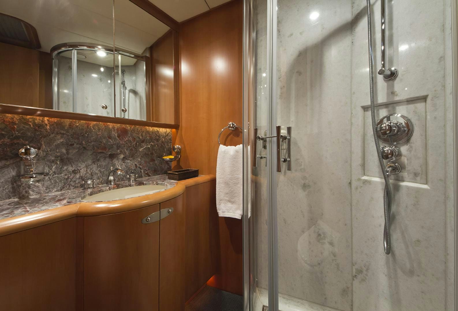 a bathroom with a large shower aboard HAVANA OF LONDON Yacht for Sale
