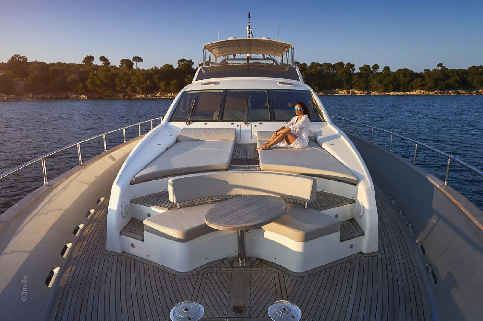 a person sitting on a boat aboard HUMMINGBIRD Yacht for Sale