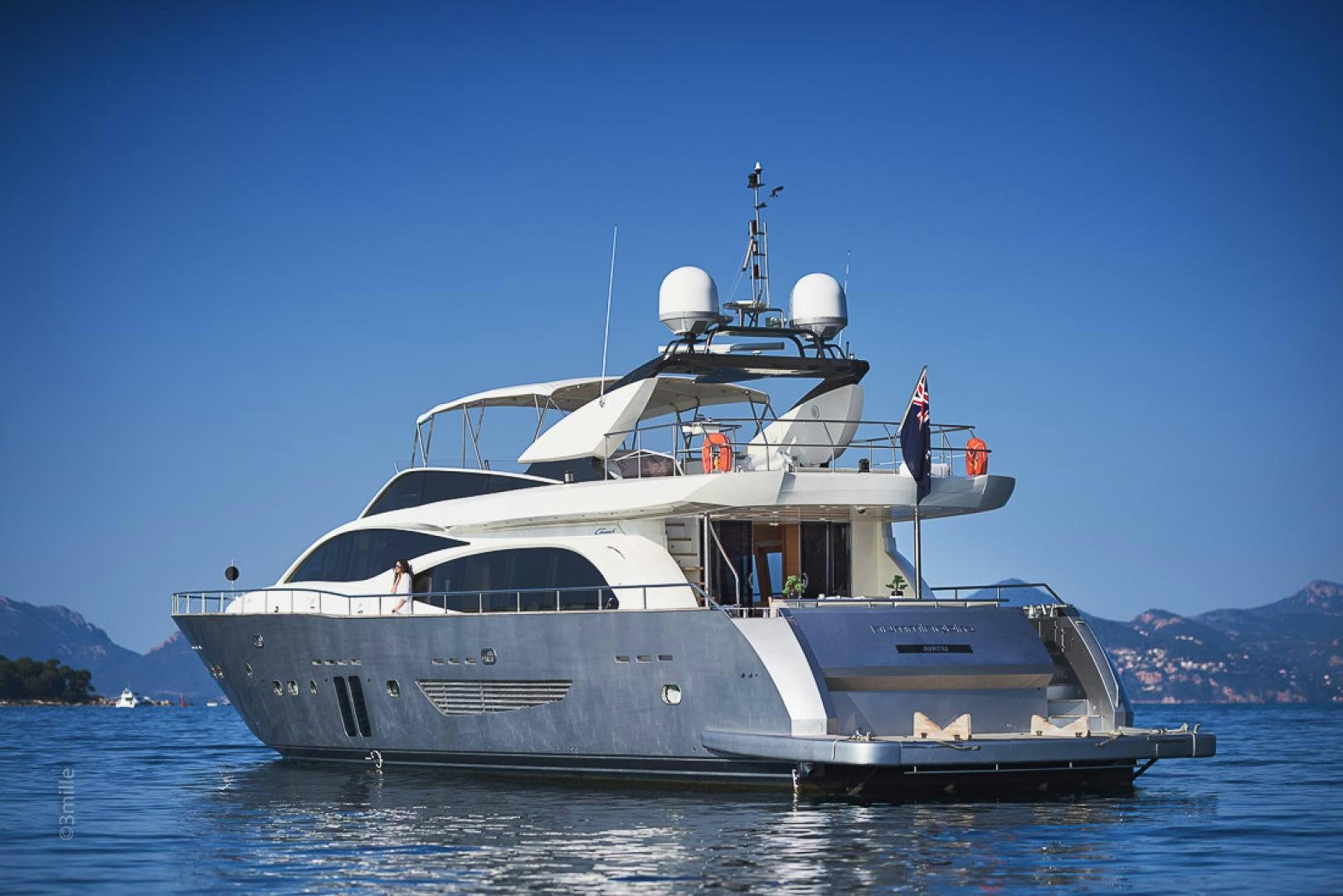 a large white boat in the water aboard HUMMINGBIRD Yacht for Sale