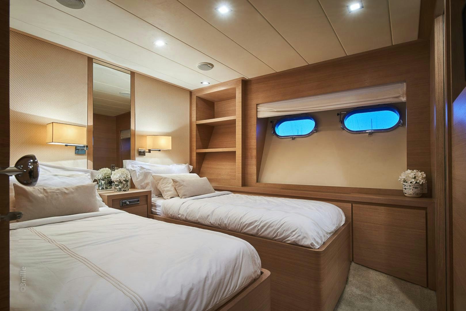 a room with two beds aboard HUMMINGBIRD Yacht for Sale