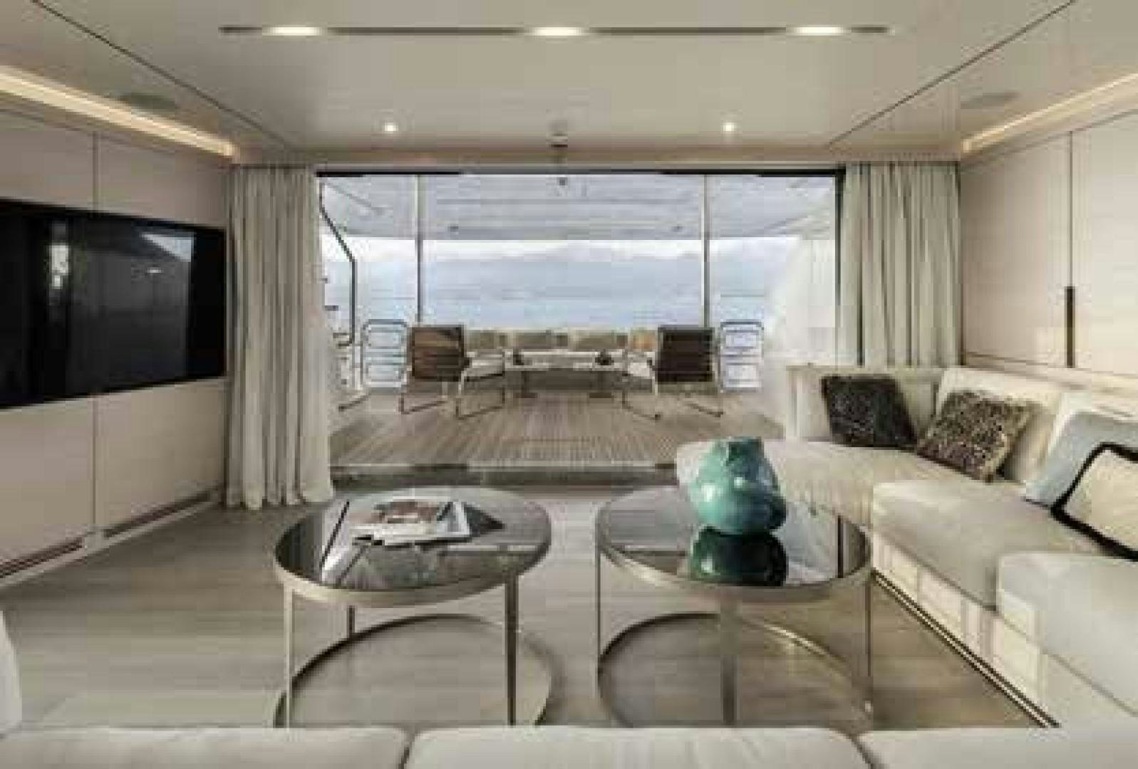 a living room with a large window aboard No Name Yacht for Sale
