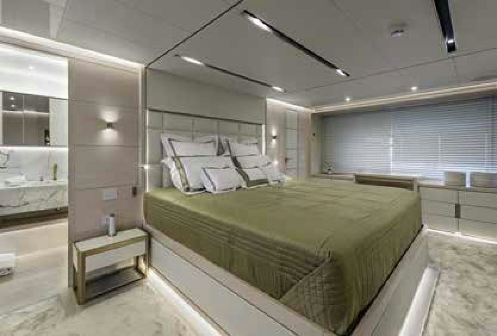 a bed in a room aboard No Name Yacht for Sale