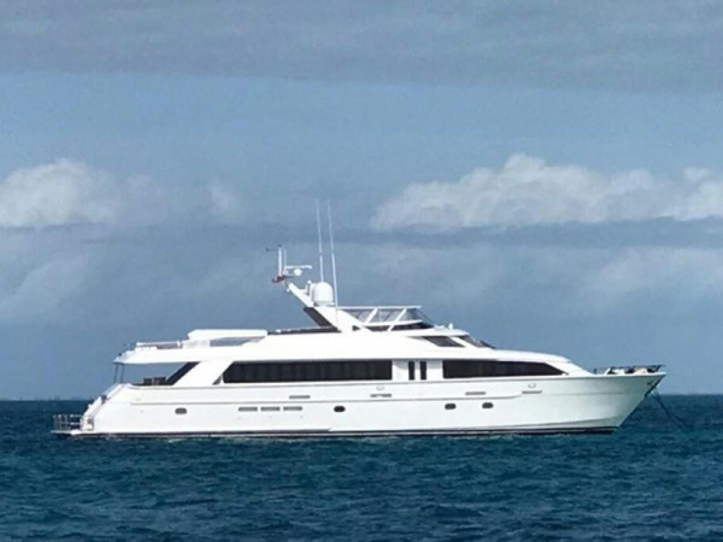 a white yacht in the water aboard TAIMA Yacht for Sale