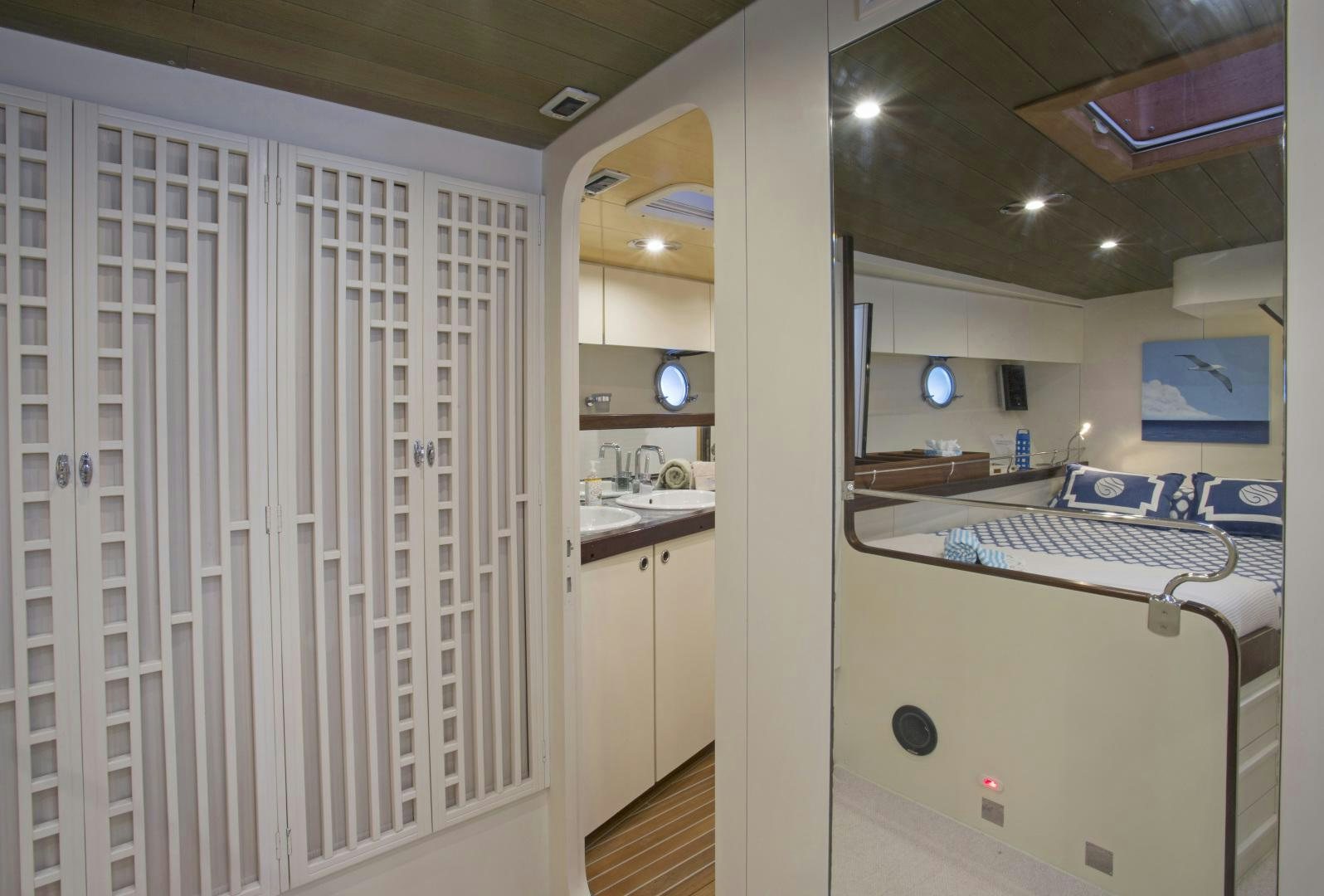 a bathroom with a large mirror aboard JUPITER Yacht for Sale