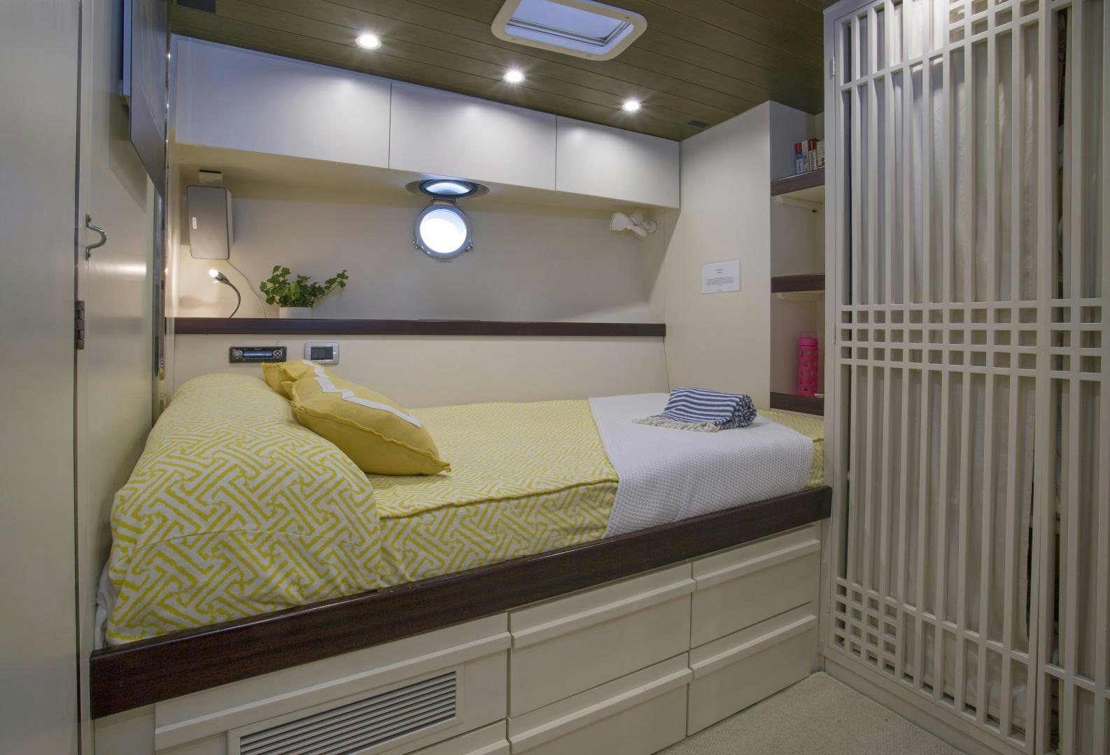 a bed in a room aboard JUPITER Yacht for Sale