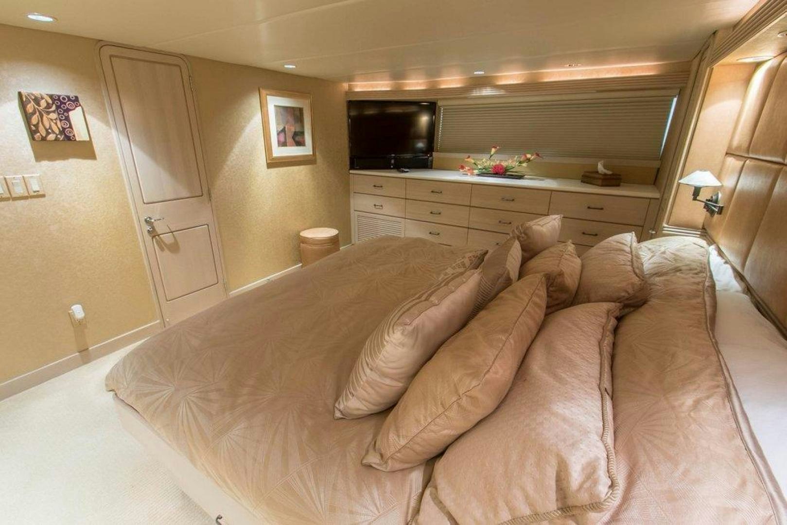 a couch in a living room aboard MONARCH Yacht for Sale