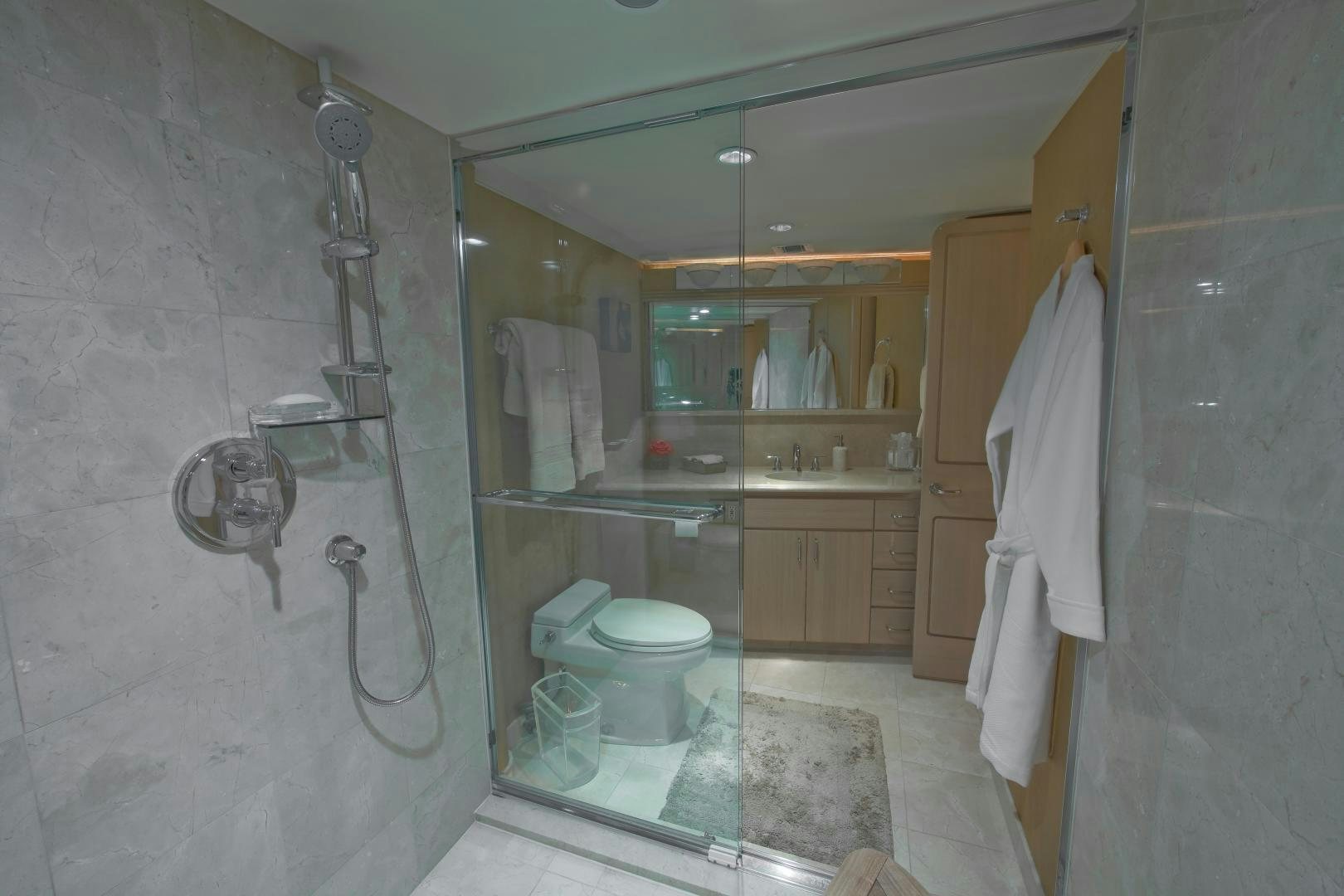 a bathroom with a toilet and a sink aboard MONARCH Yacht for Sale