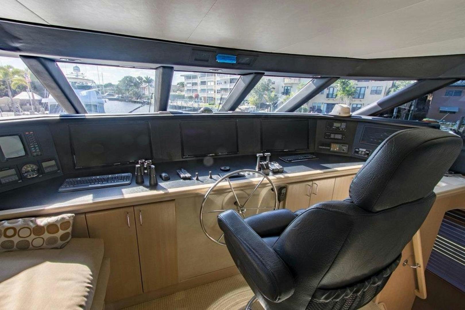 a desk with a computer and a chair aboard MONARCH Yacht for Sale