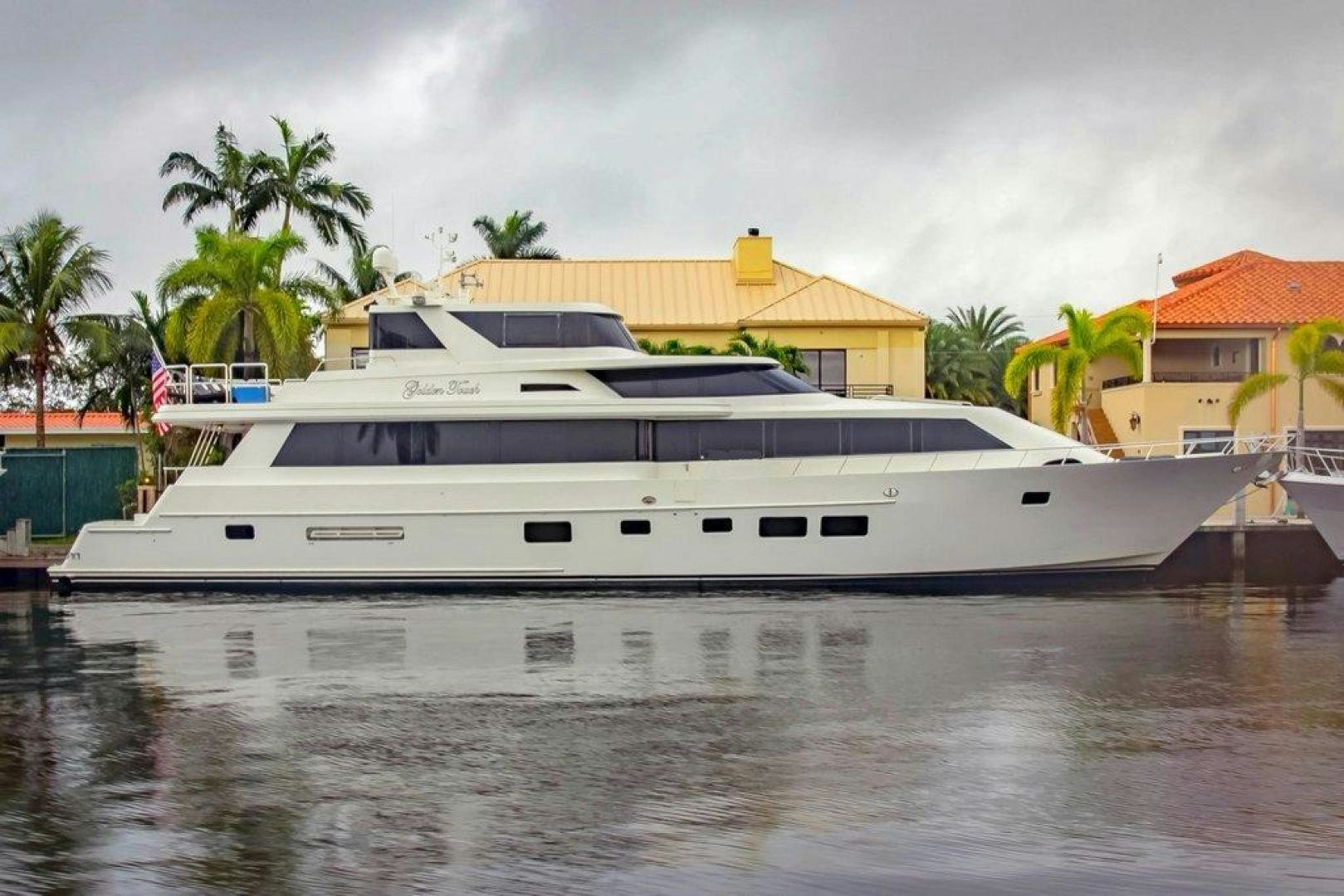 a white yacht in the water aboard MONARCH Yacht for Sale