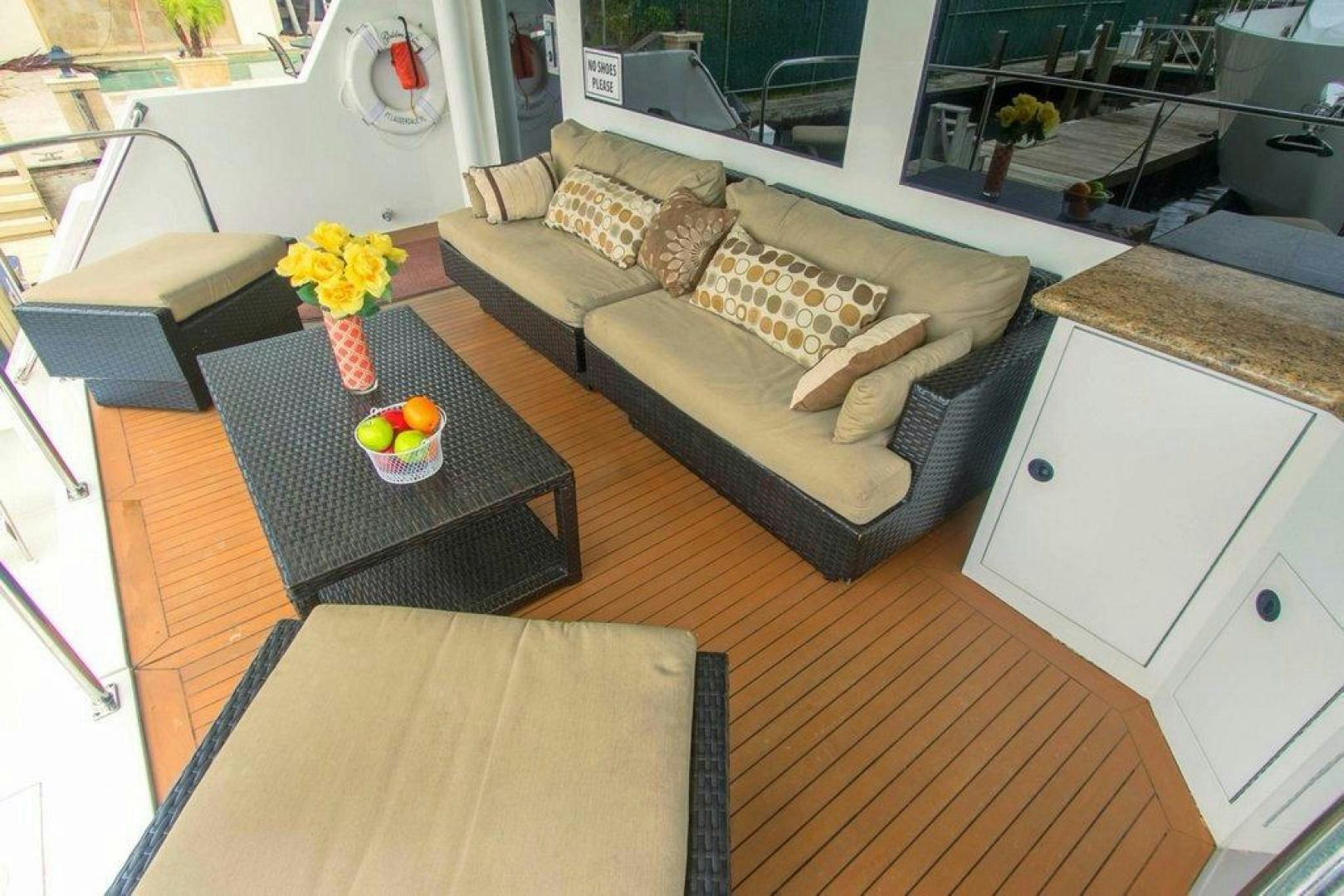 a living room with a couch aboard MONARCH Yacht for Sale