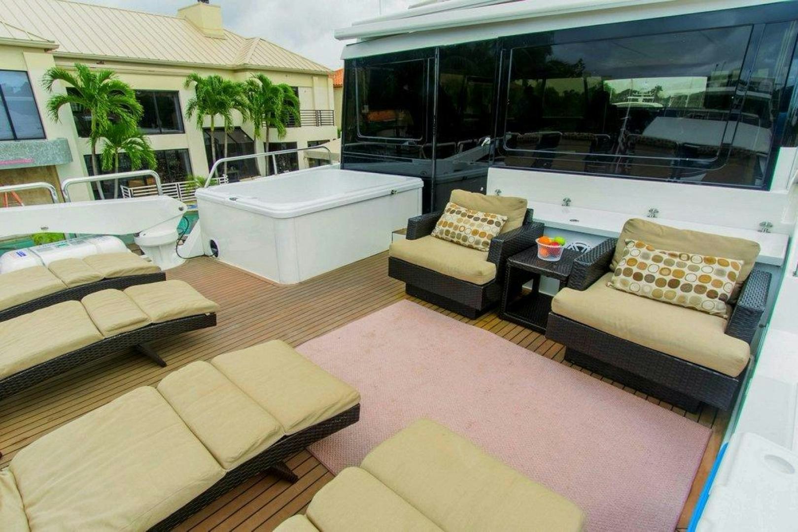 a living room with a couch and a table aboard MONARCH Yacht for Sale