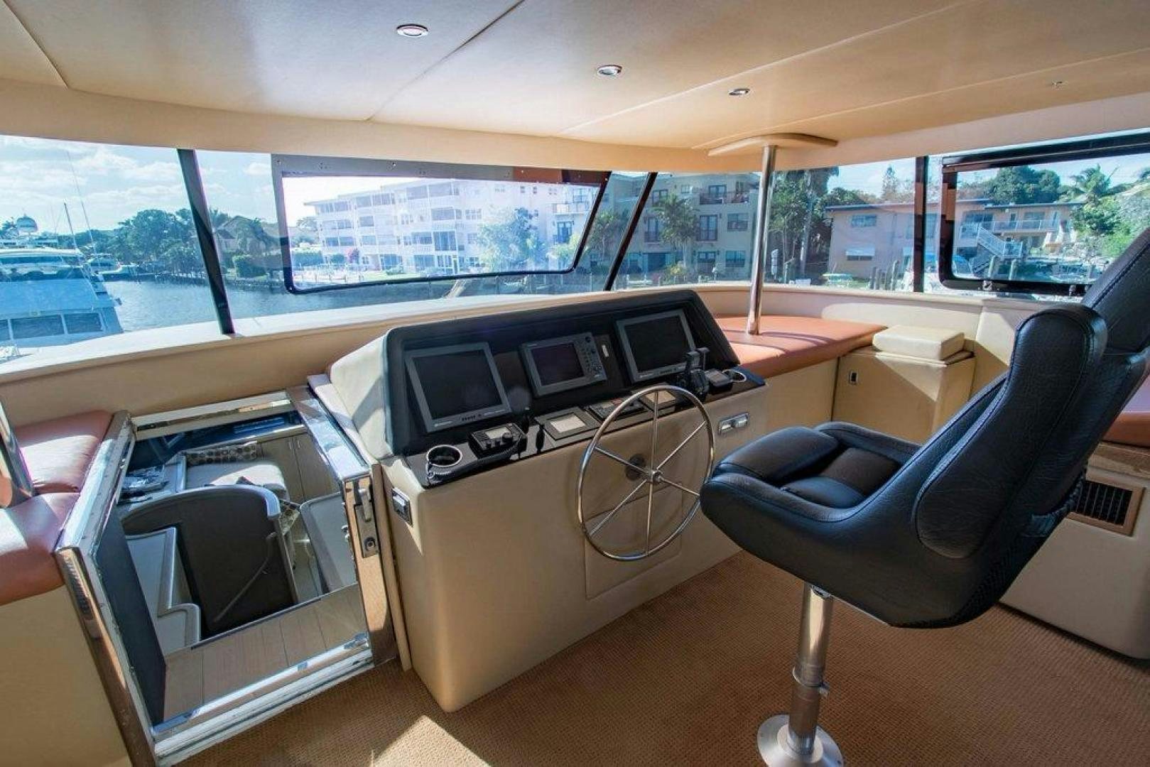 inside of a car aboard MONARCH Yacht for Sale