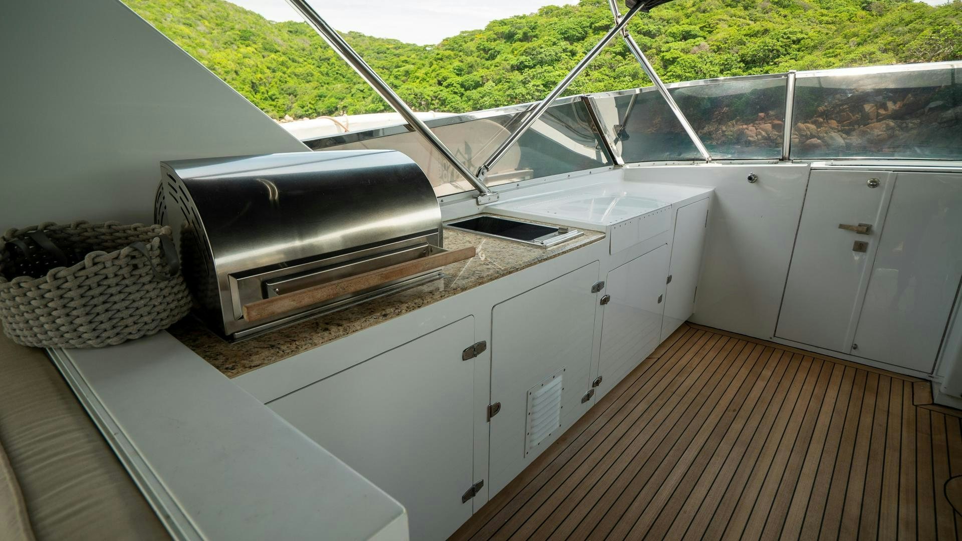 a white kitchen with a large window aboard MARAZUL Yacht for Sale