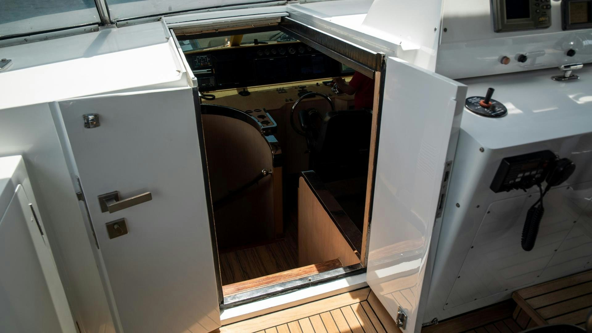 a kitchen with a stove and cabinets aboard MARAZUL Yacht for Sale