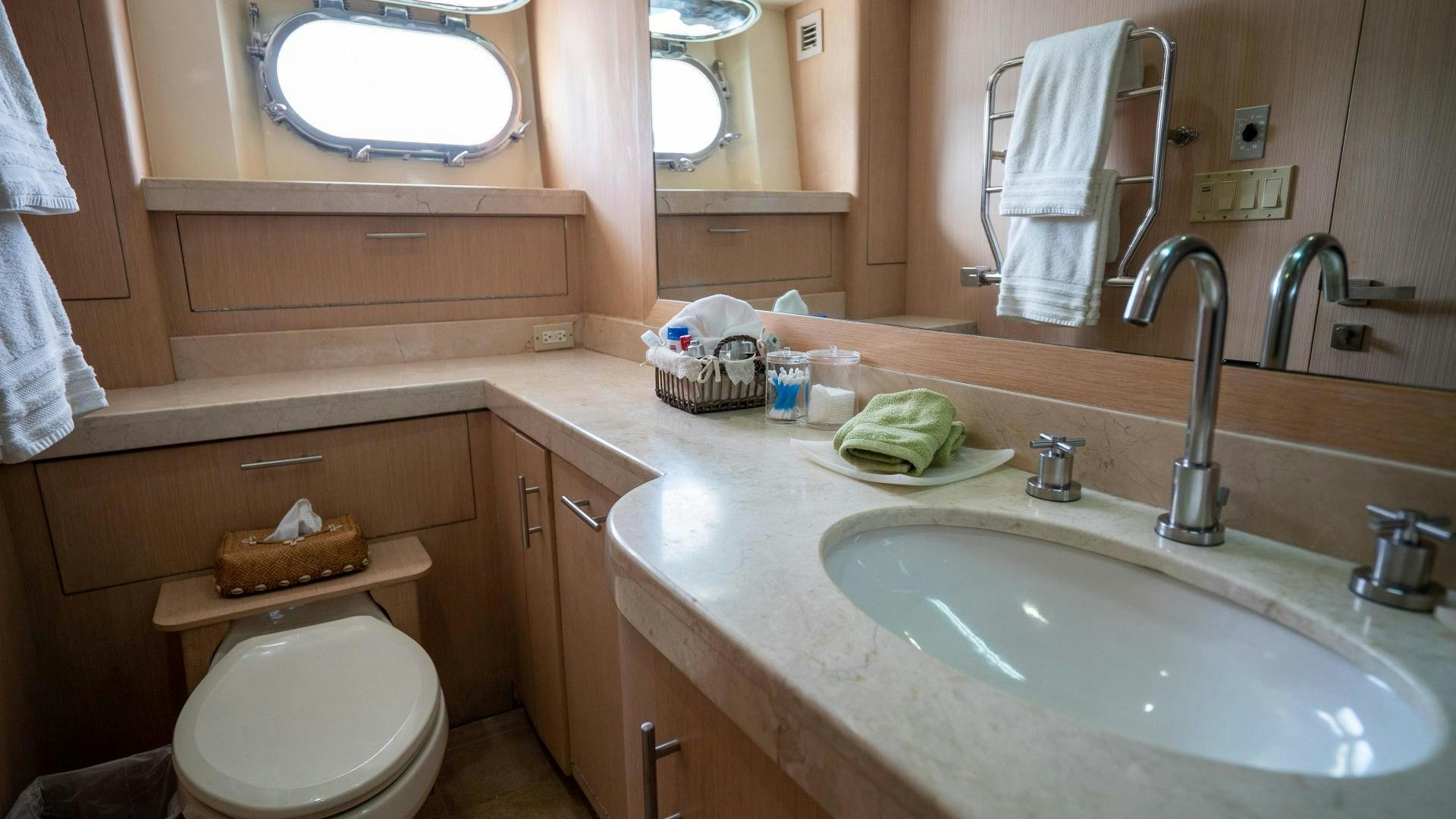a bathroom with a sink and toilet aboard MARAZUL Yacht for Sale