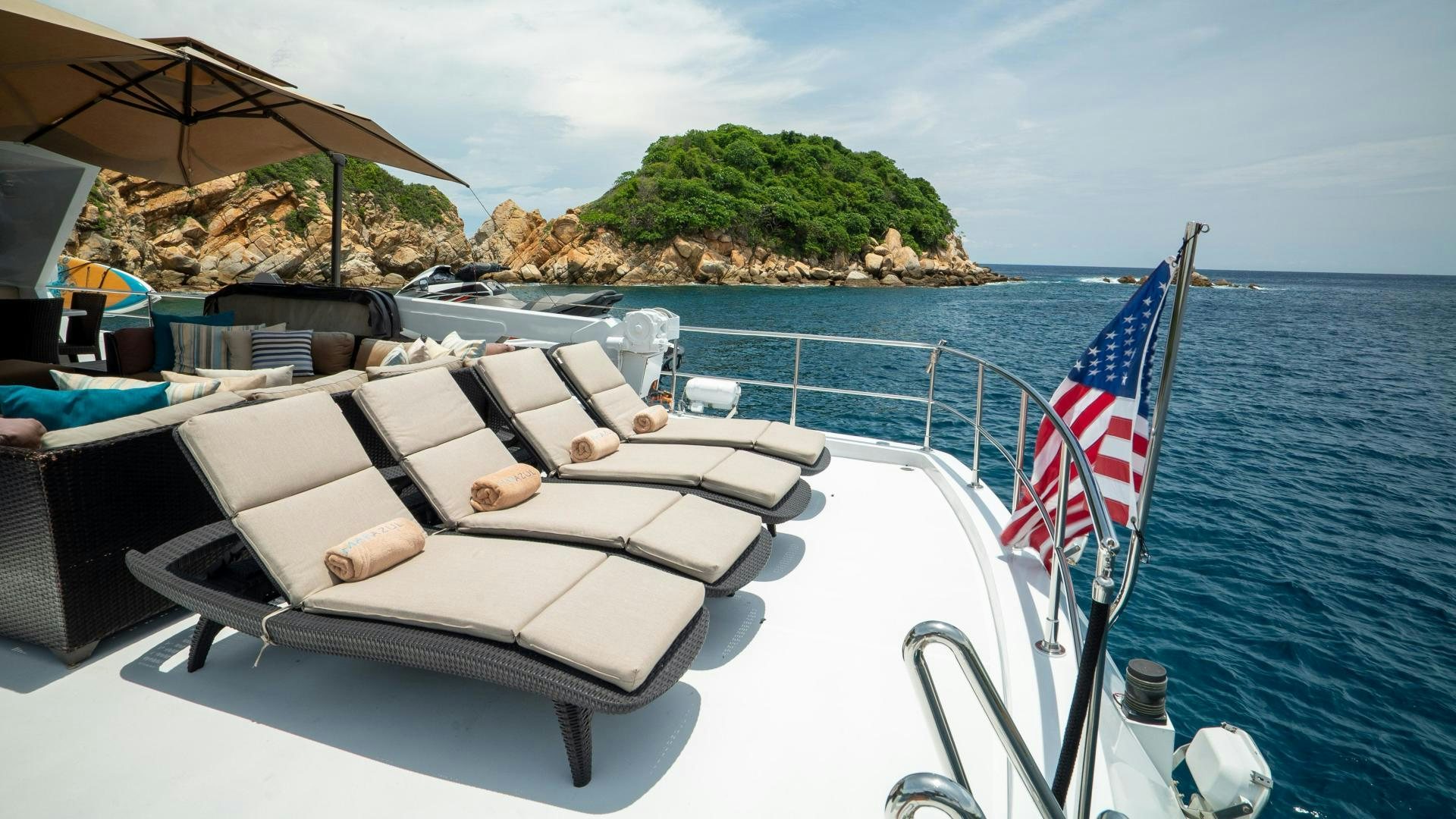 a boat with flags on it aboard MARAZUL Yacht for Sale
