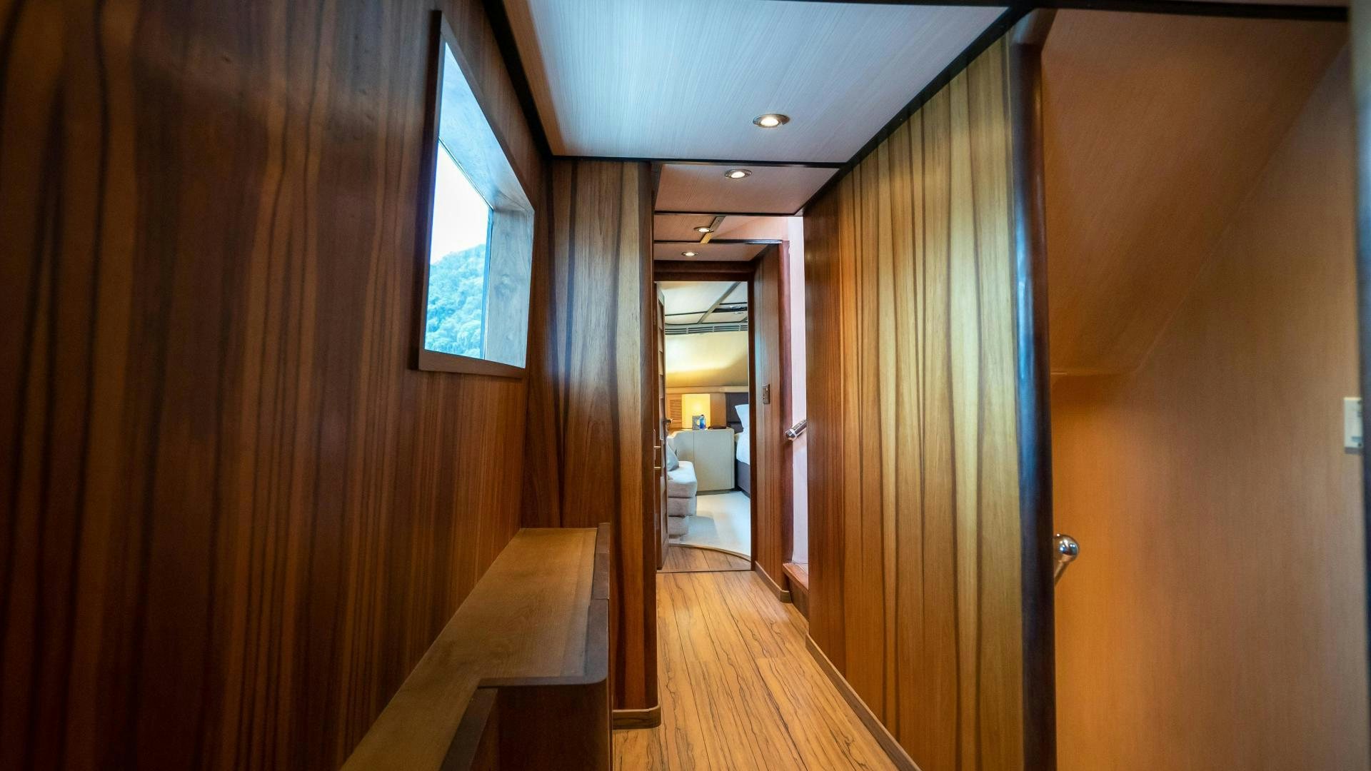 a room with a wood floor and a wood door aboard MARAZUL Yacht for Sale