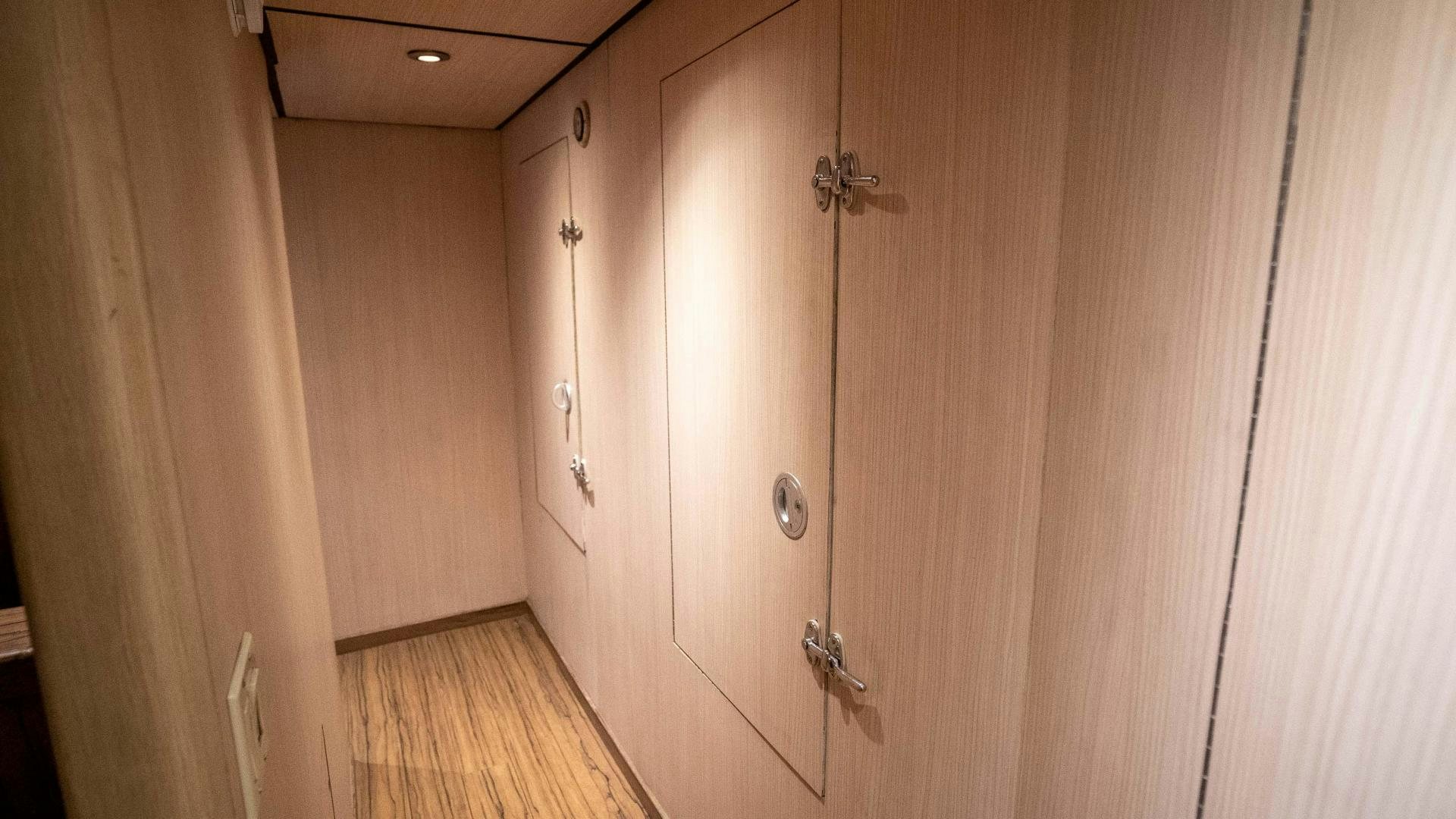 a room with wooden walls aboard MARAZUL Yacht for Sale