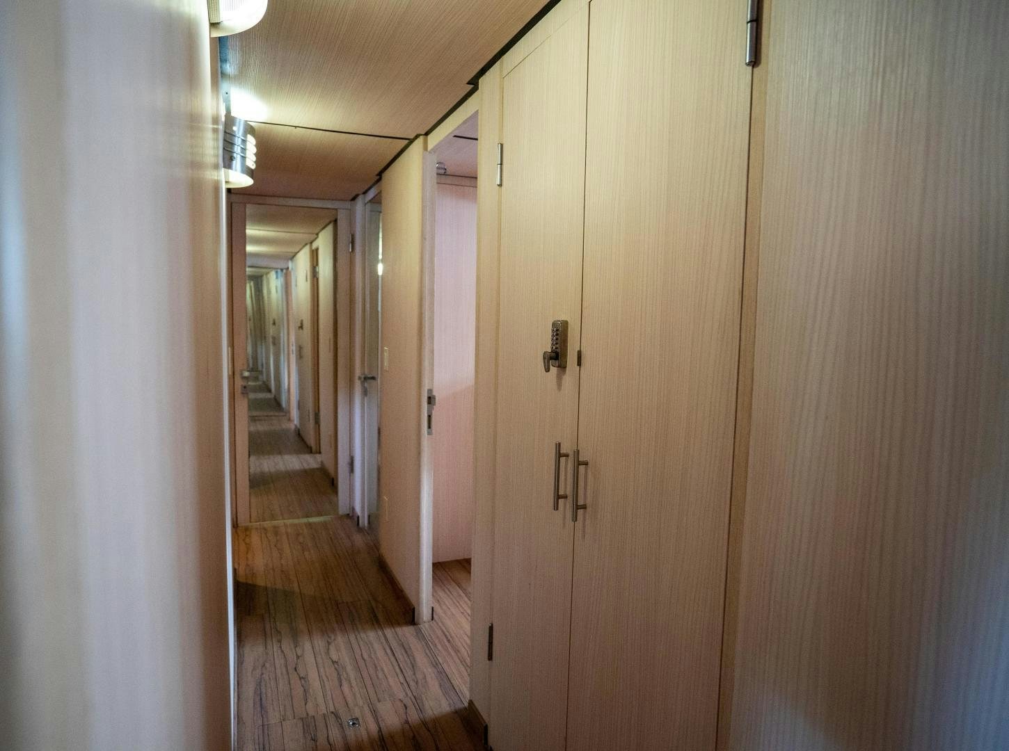 a hallway with doors aboard MARAZUL Yacht for Sale