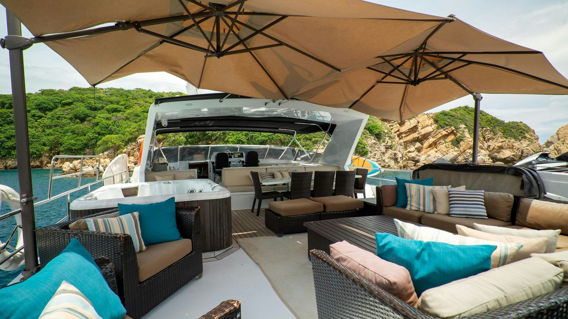 a large patio with a large umbrella aboard MARAZUL Yacht for Sale