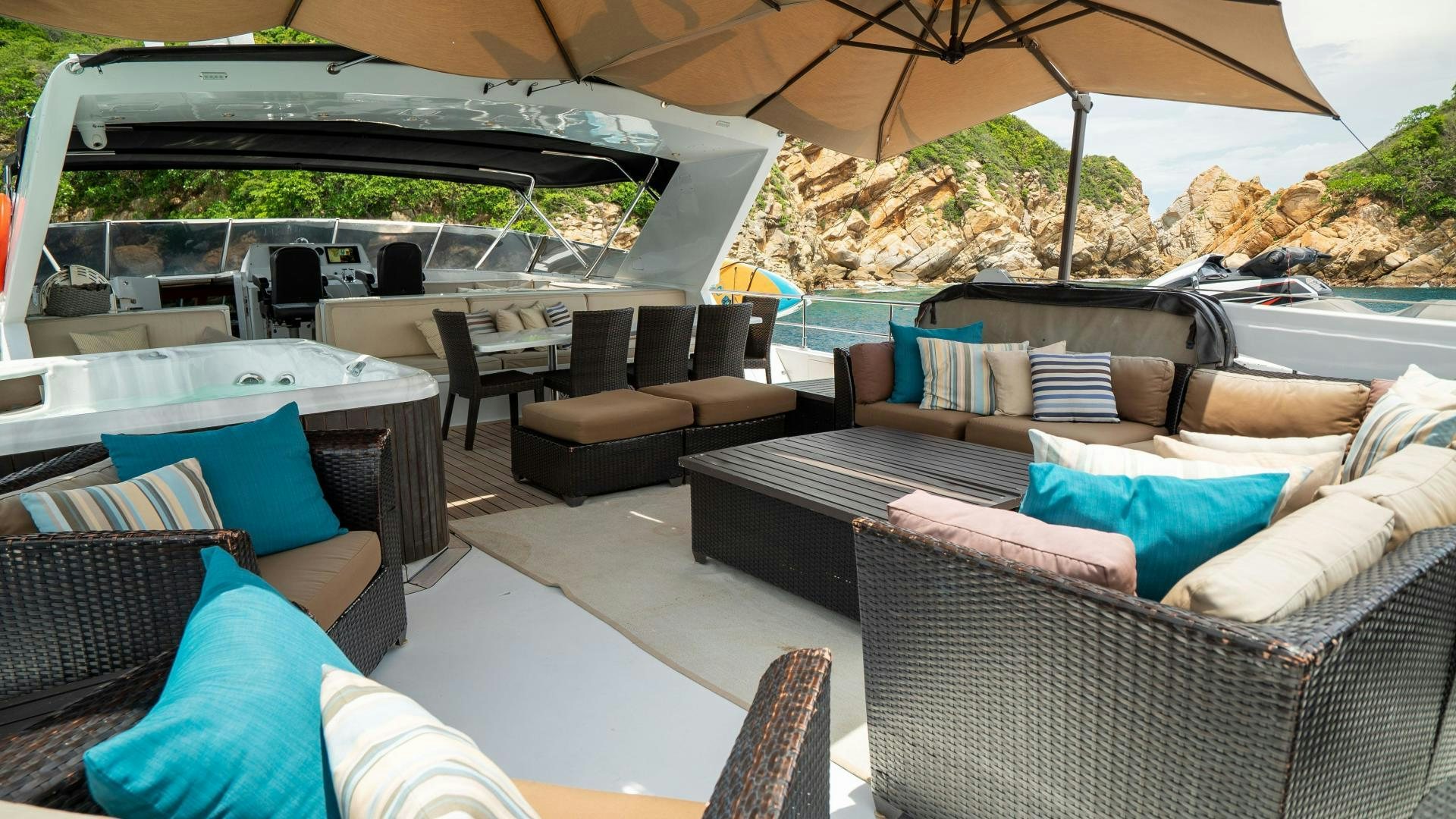 a large living room with a large open roof aboard MARAZUL Yacht for Sale