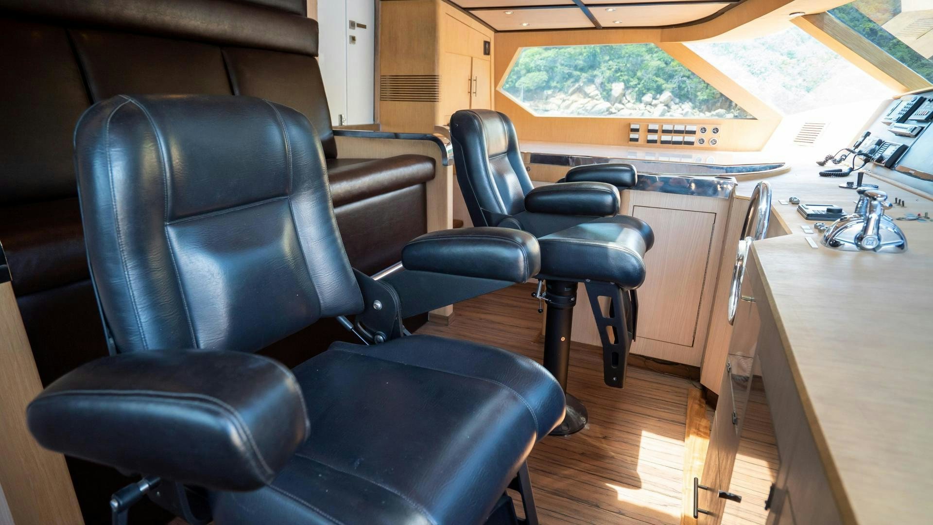 a room with chairs and a table aboard MARAZUL Yacht for Sale