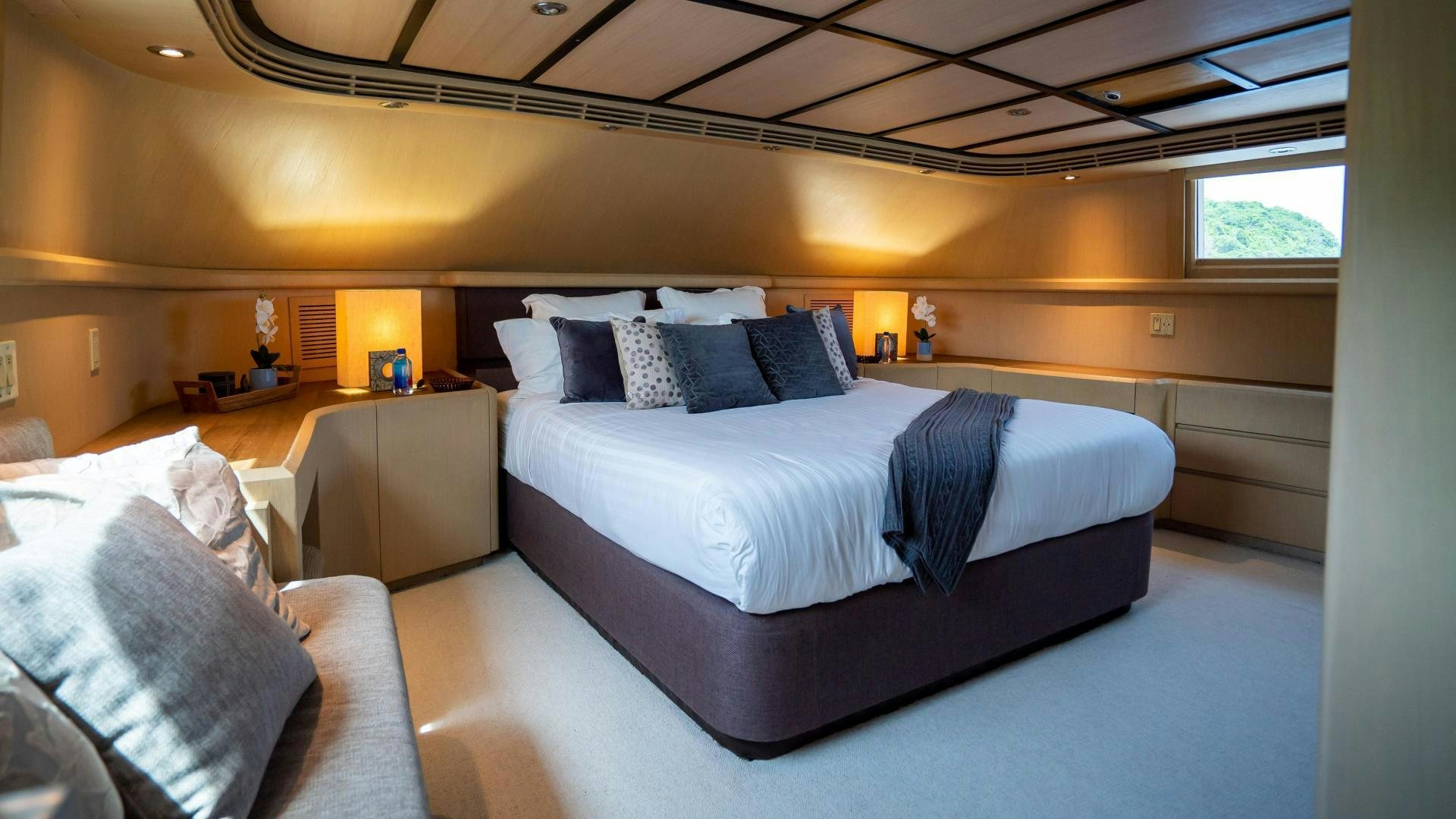 a room with a bed and a desk aboard MARAZUL Yacht for Sale