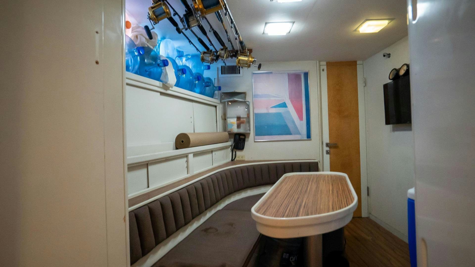 a bathroom with a tub sink and cabinets aboard MARAZUL Yacht for Sale