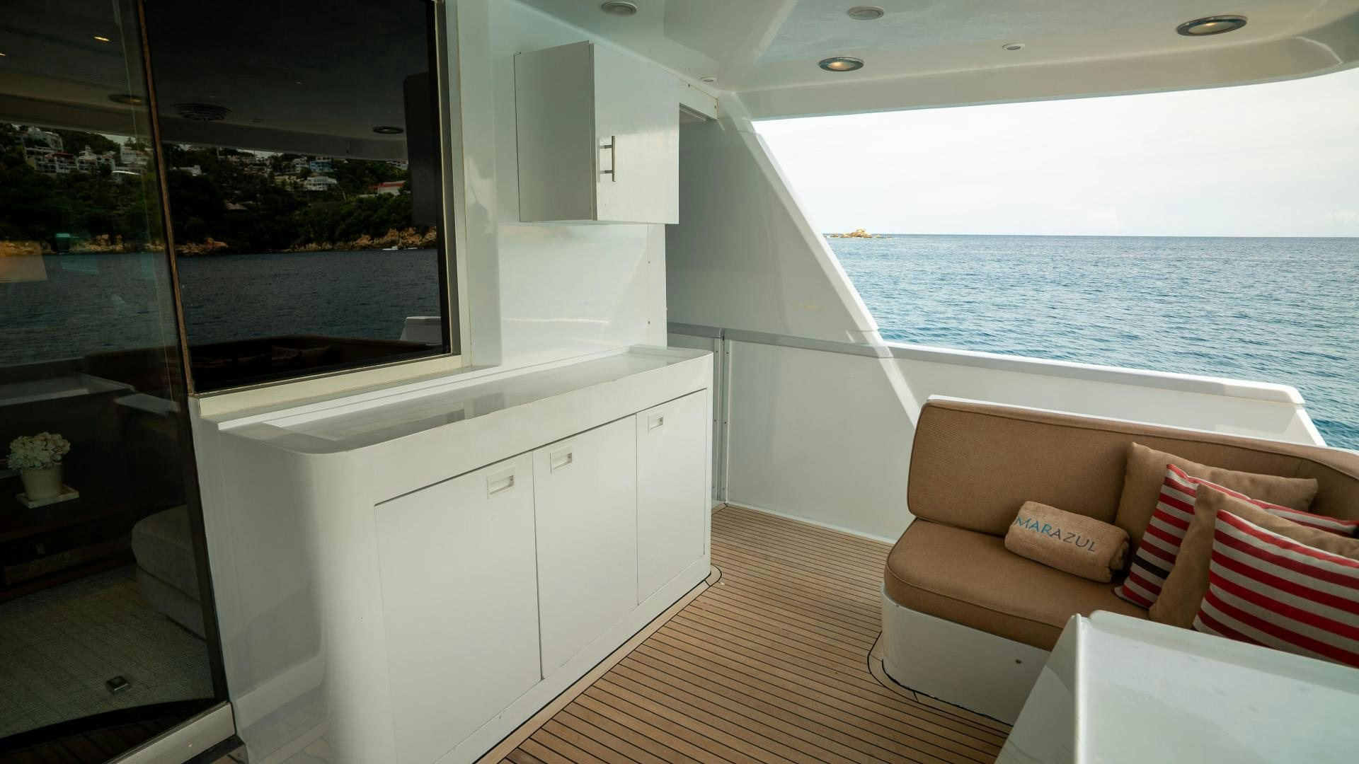 a room with a view of the ocean and a large window aboard MARAZUL Yacht for Sale
