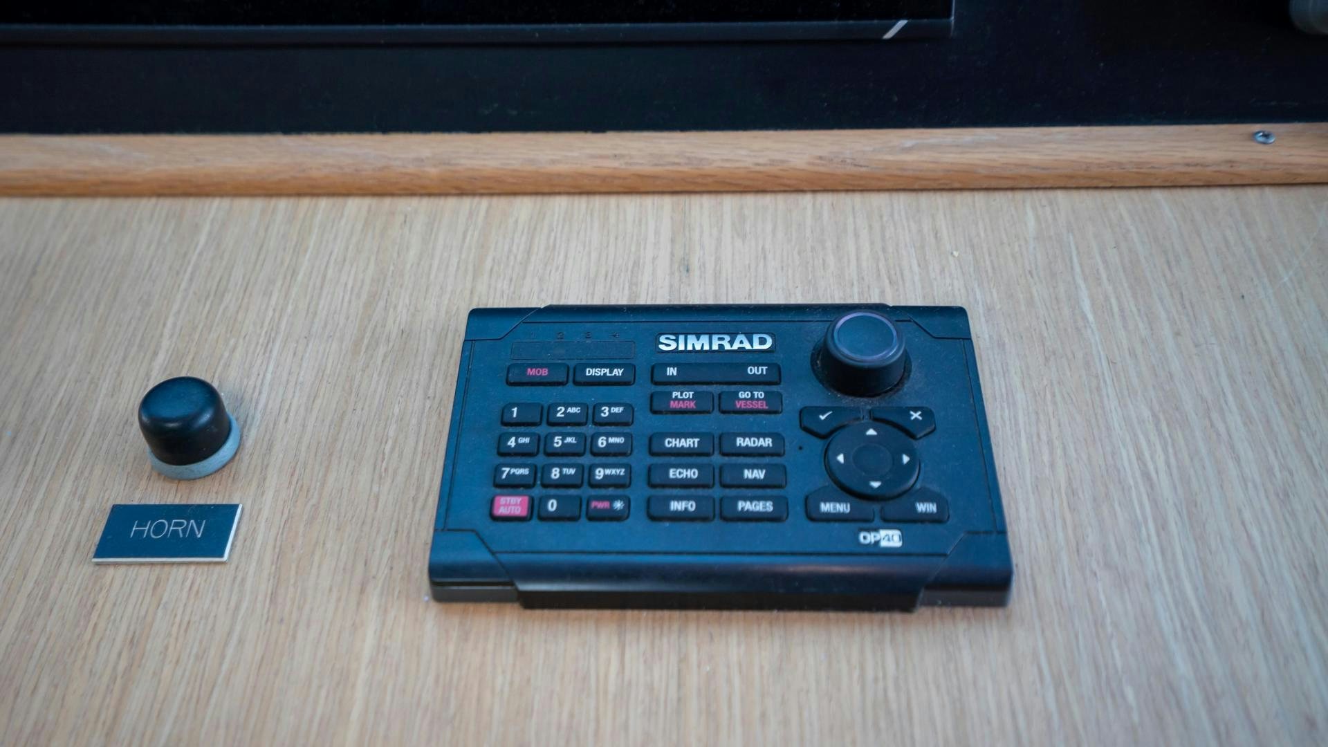 a black remote control aboard MARAZUL Yacht for Sale