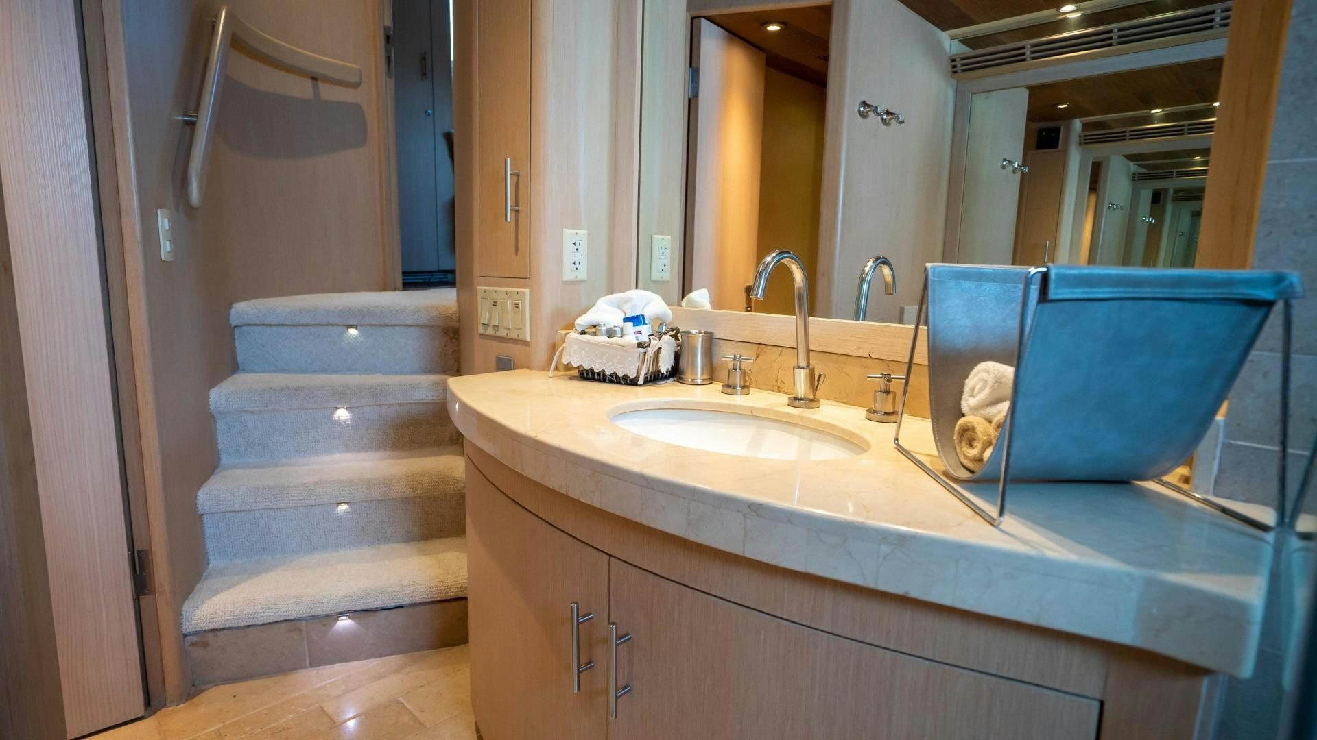 a bathroom with a sink and a mirror aboard MARAZUL Yacht for Sale