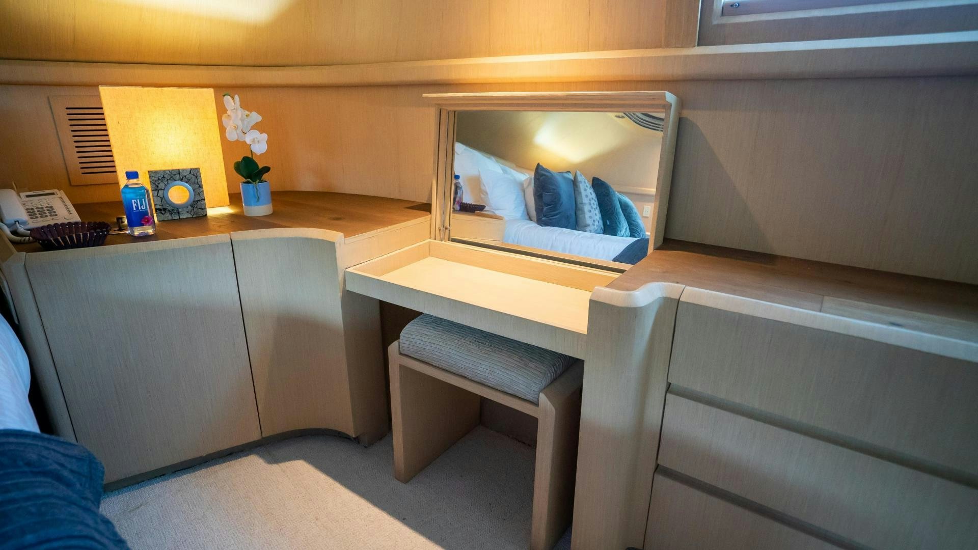 a room with a desk and a bed aboard MARAZUL Yacht for Sale