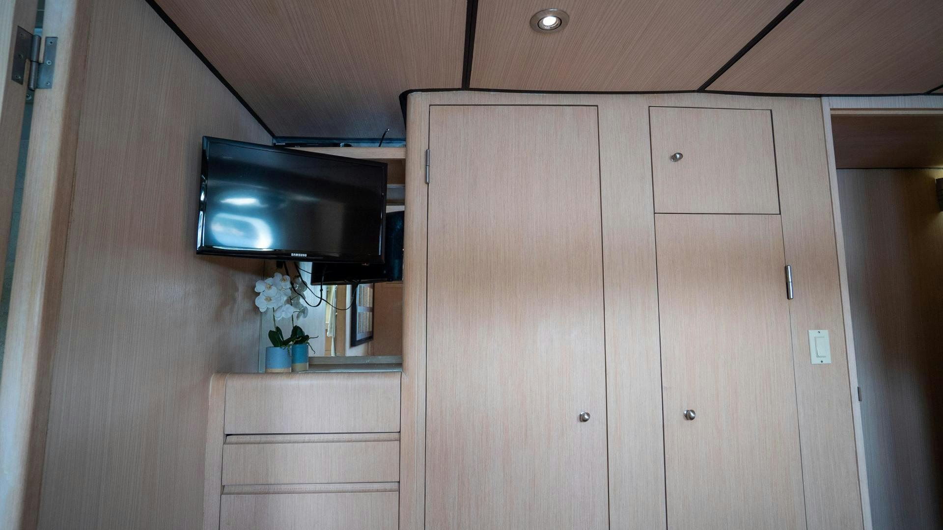 a room with a cupboard and a microwave aboard MARAZUL Yacht for Sale