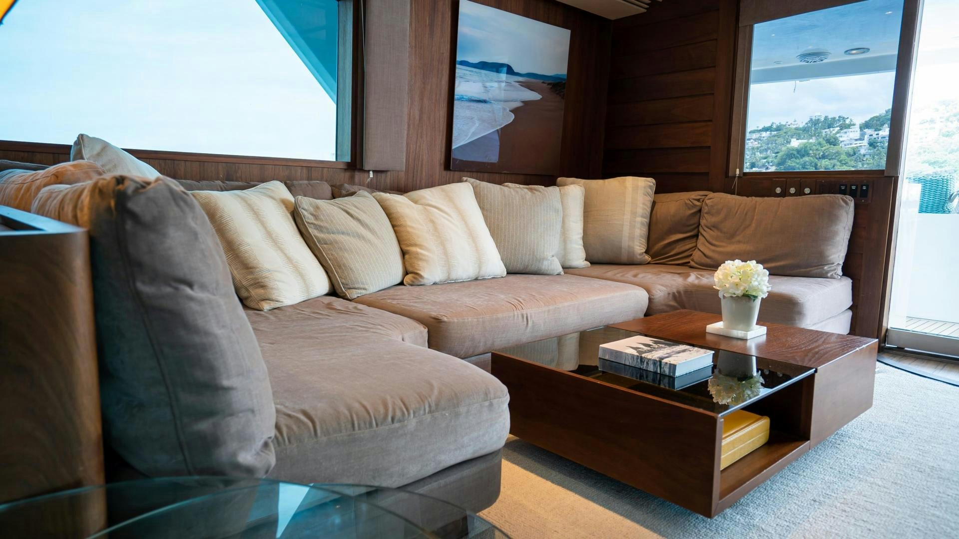 a couch with a coffee table aboard MARAZUL Yacht for Sale