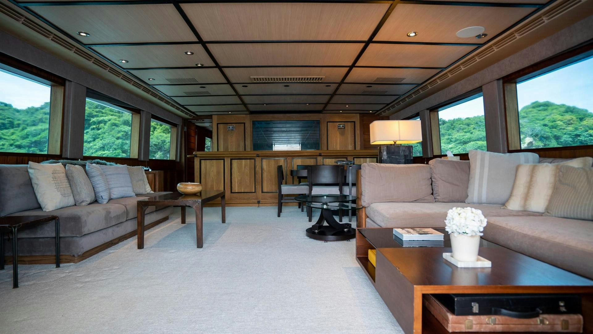 a living room with a couch and a coffee table aboard MARAZUL Yacht for Sale