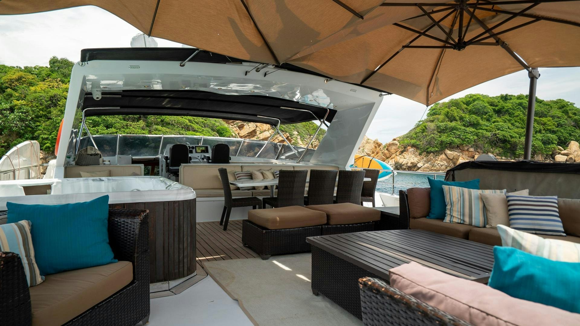 a patio with a table and chairs aboard MARAZUL Yacht for Sale