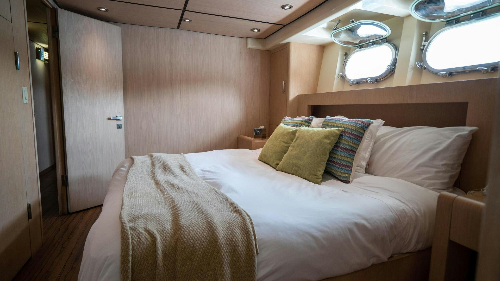 a bed in a room aboard MARAZUL Yacht for Sale