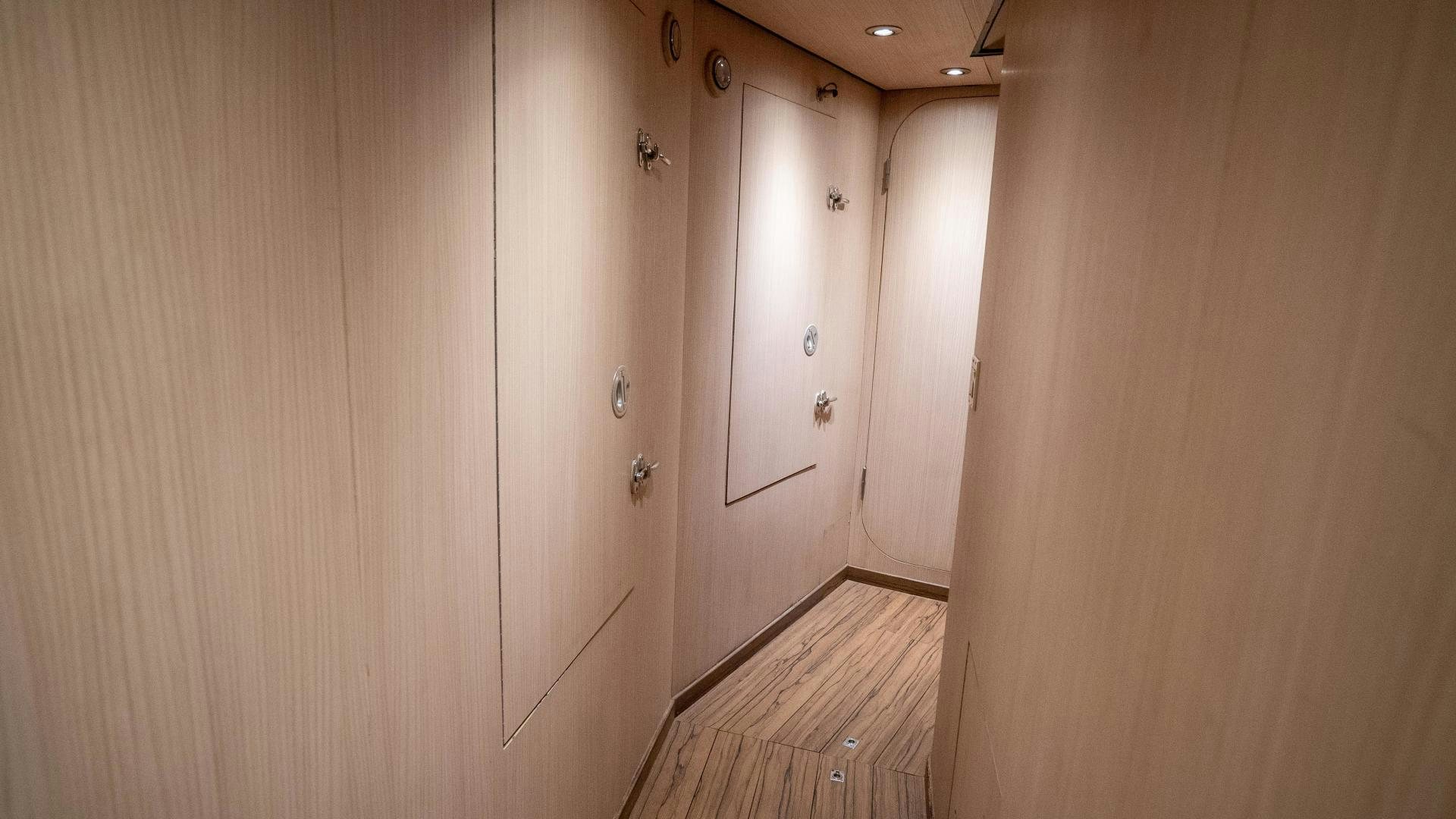 a room with wooden walls aboard MARAZUL Yacht for Sale