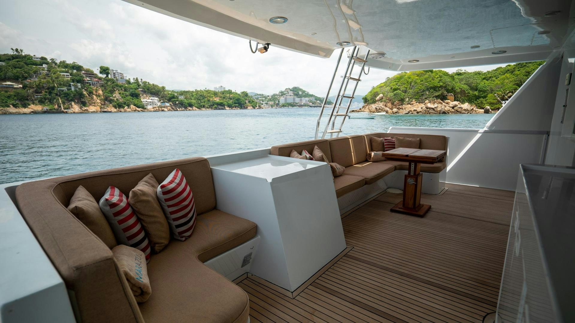 a room with a view of a city and a body of water aboard MARAZUL Yacht for Sale