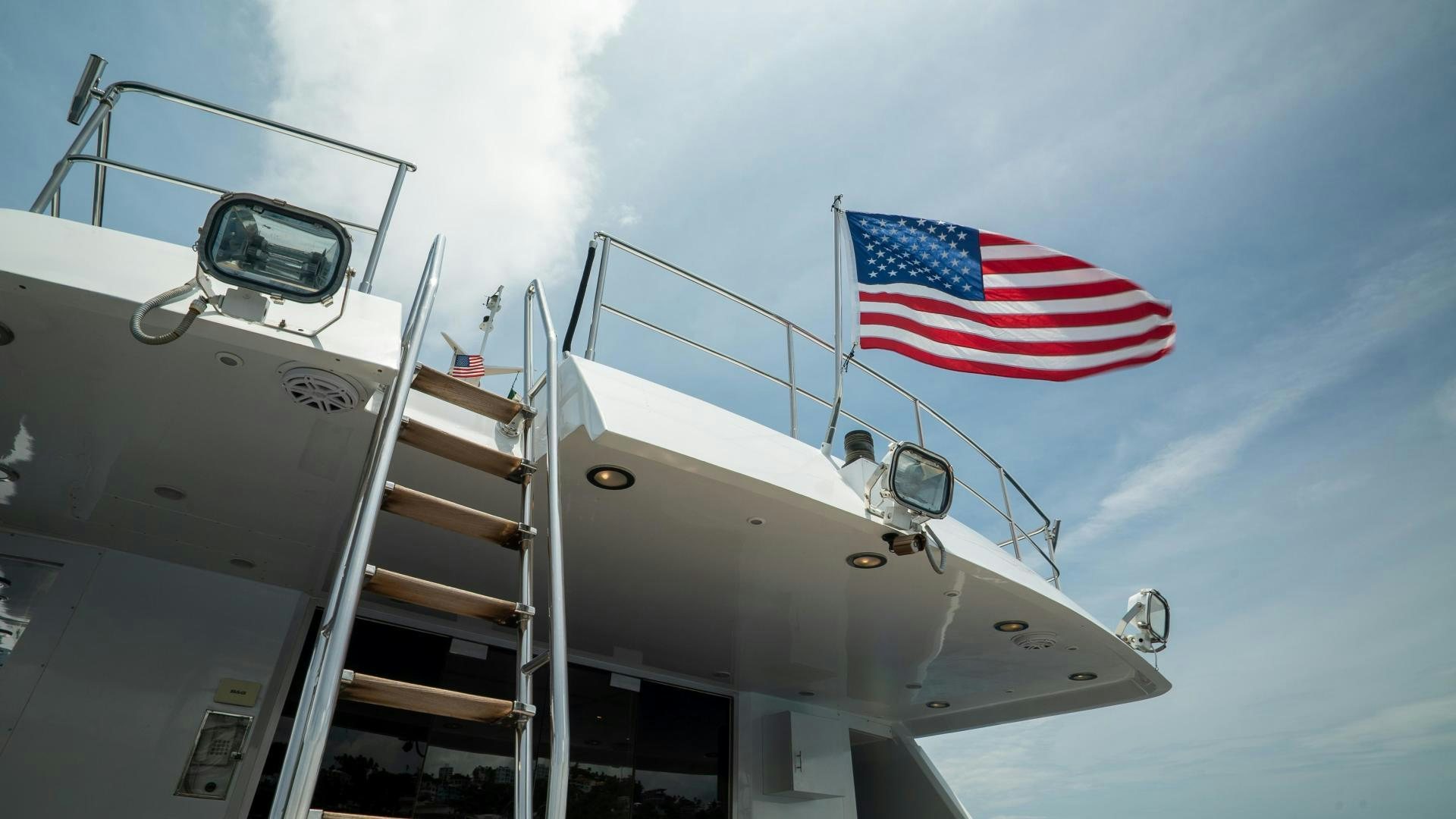 a large military ship with a flag on top aboard MARAZUL Yacht for Sale