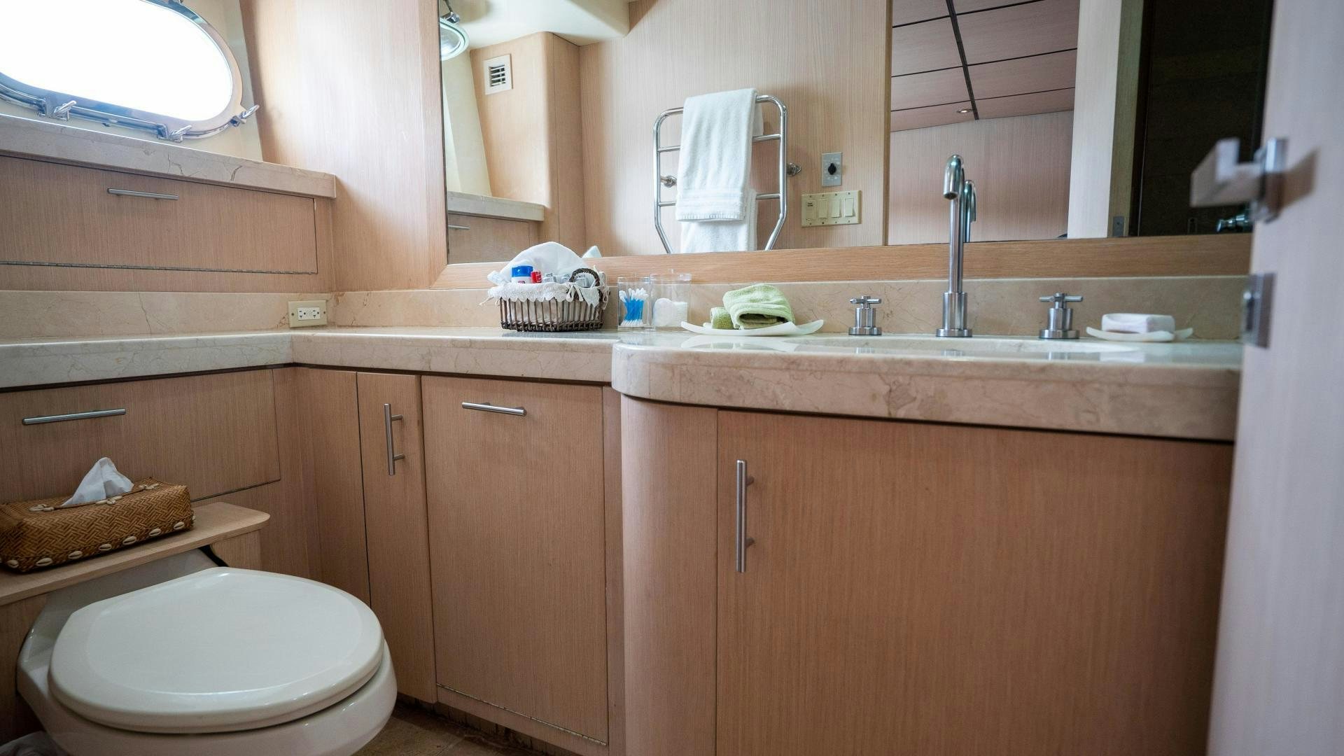 a bathroom with a sink and toilet aboard MARAZUL Yacht for Sale