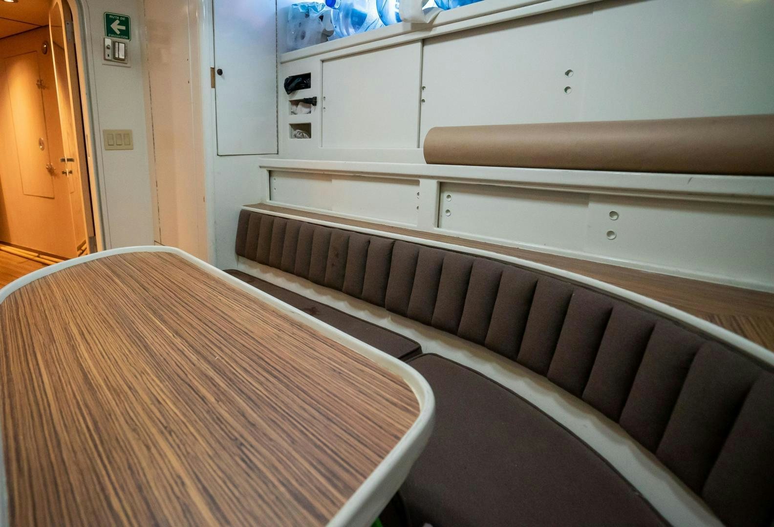 a wooden bench in a room aboard MARAZUL Yacht for Sale
