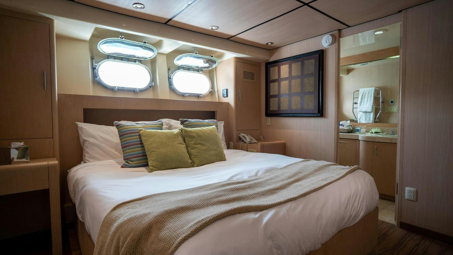 a bed in a room aboard MARAZUL Yacht for Sale