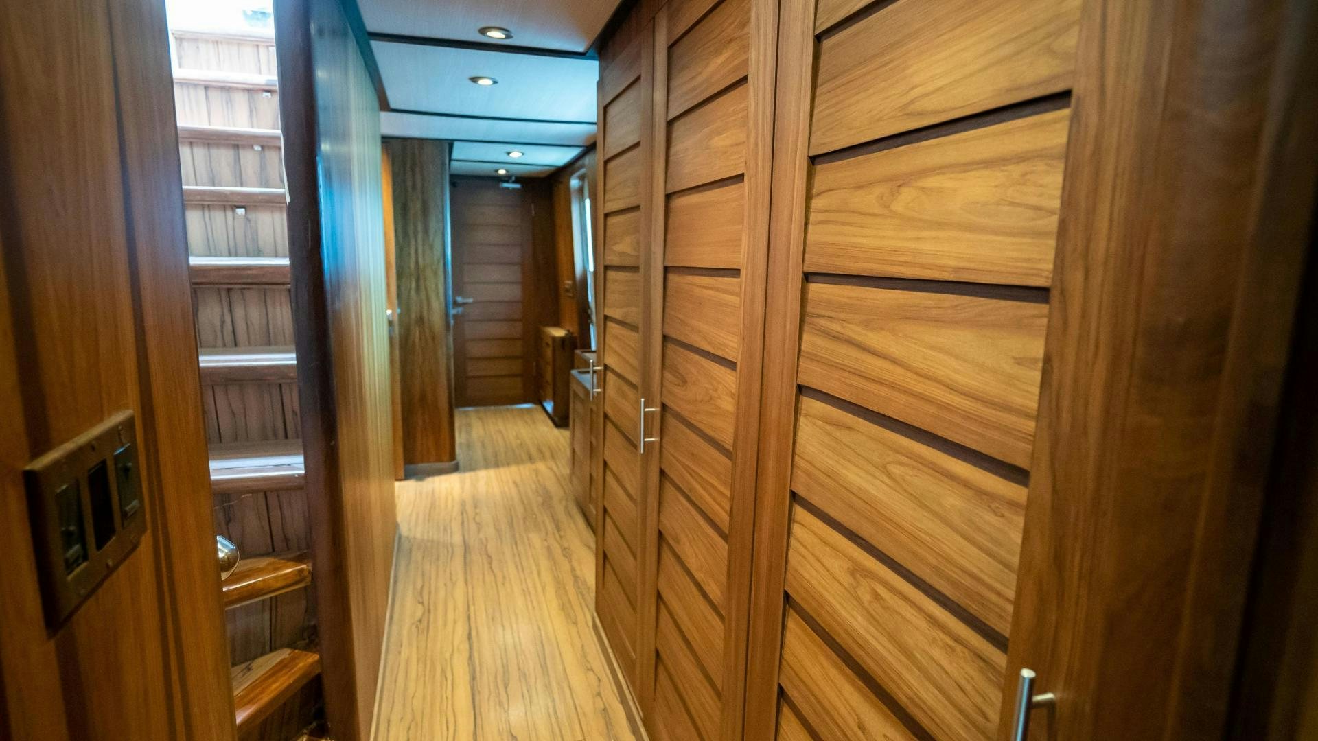 a room with wooden doors aboard MARAZUL Yacht for Sale