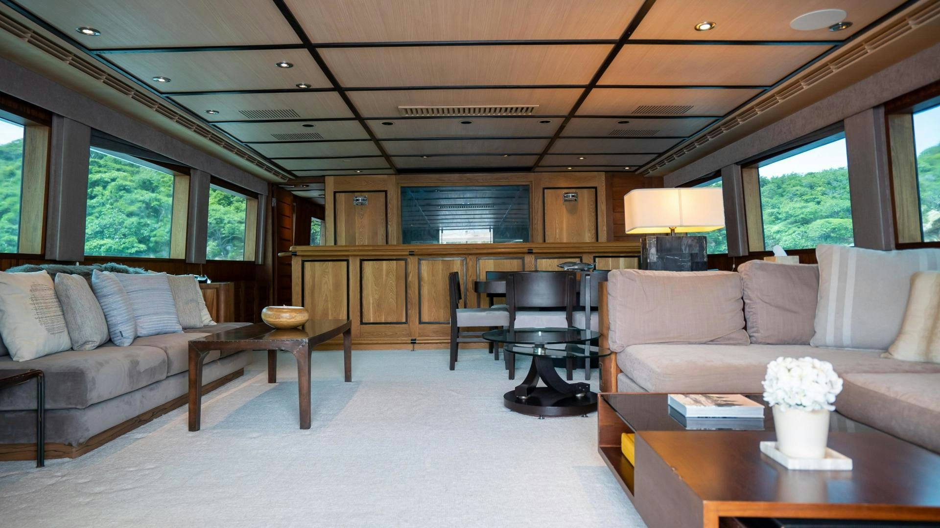 a living room with a couch and a coffee table aboard MARAZUL Yacht for Sale