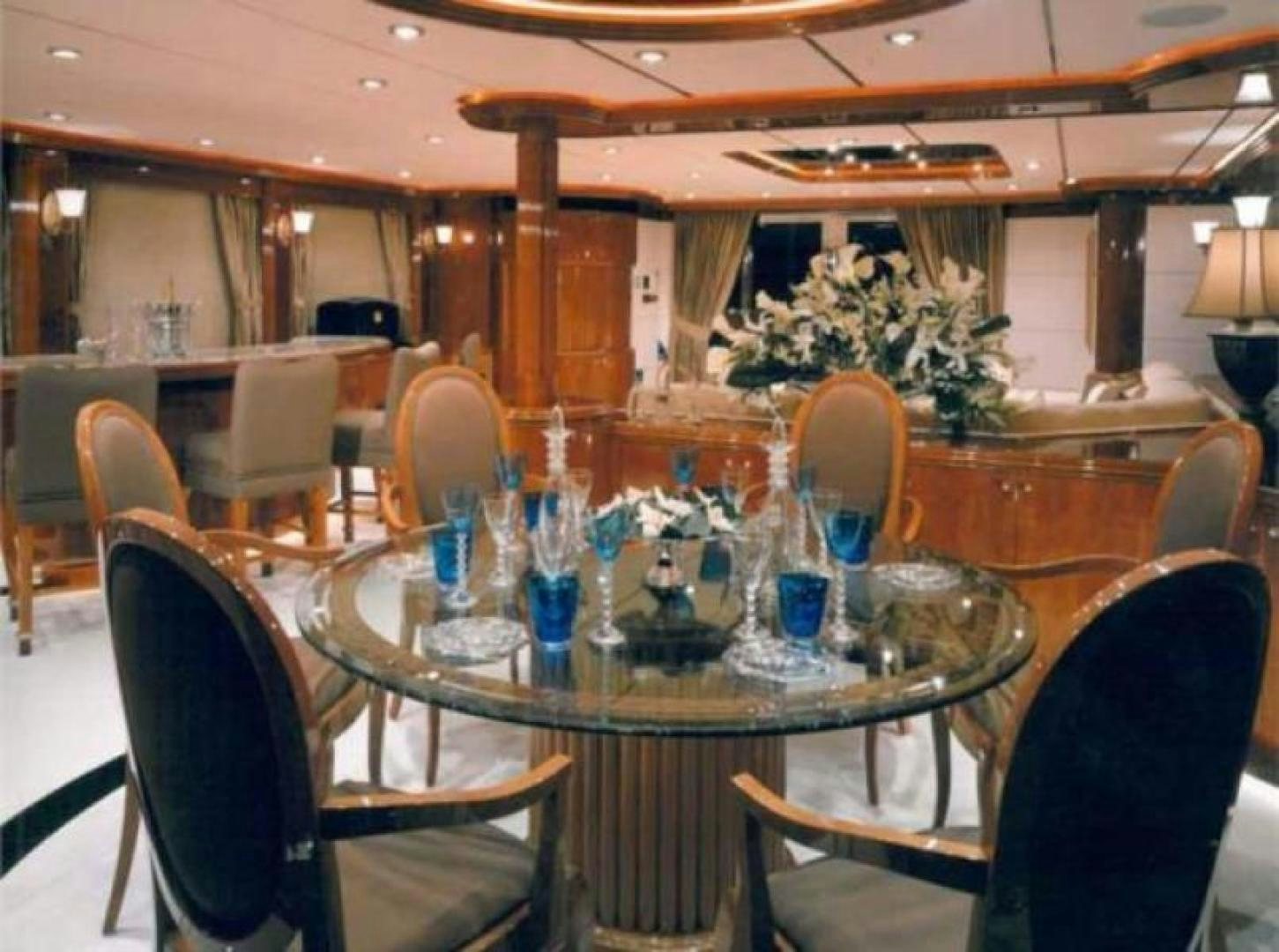 a dining room with a table set aboard MY DESTINY Yacht for Sale