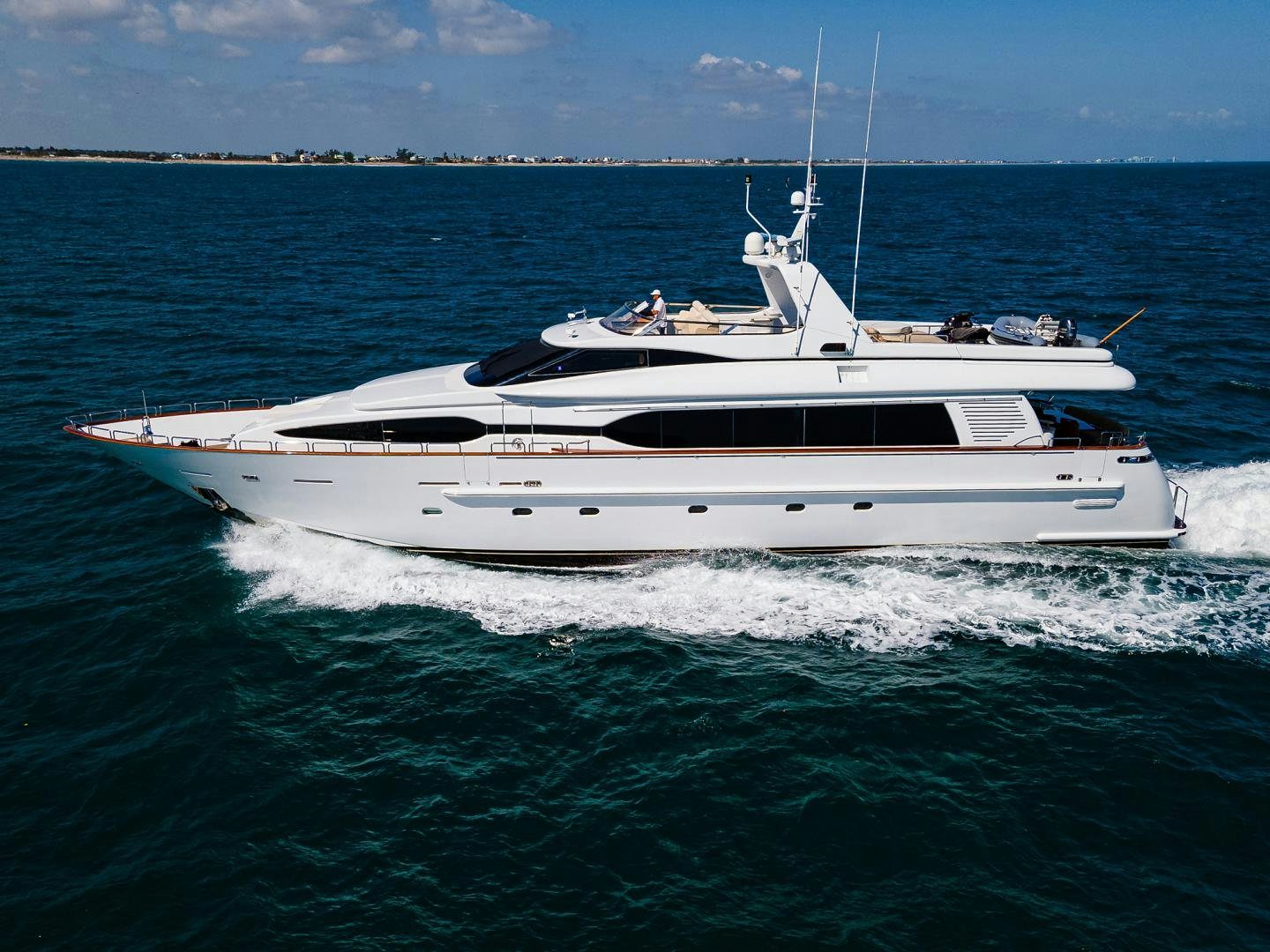 a white boat in the water aboard MY DESTINY Yacht for Sale